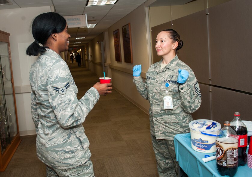 U.S. Air Force Master Sgt. Abigail Esparza, 23d Medical Support Squadron Pharmacy Flight chief, speaks with an Airman during a Biomedical Science Corps Week event at Moody Air Force Base, Ga., Jan. 31, 2014. The focus of this year’s BSC Week was to recognize and celebrate all the hard work accomplished by BSCs and the technicians that work with them, including active duty and civilians. (U.S. Air Force photo by Senior Airman Jarrod Grammel/Released)
