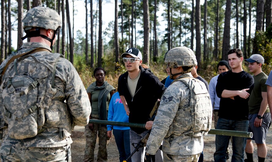A group of protesters confront 822nd Base Defense Squadron members during EXERCISE SAFESIDE GUARDIAN, Jan. 27, 2014, at Moody Air Force Base, Ga. Other scenarios included mass casualty situations, airborne insertion and setting up a forward operating base. (U.S. Air Force photo by Airman 1st Class Sandra Marrero/ Released)