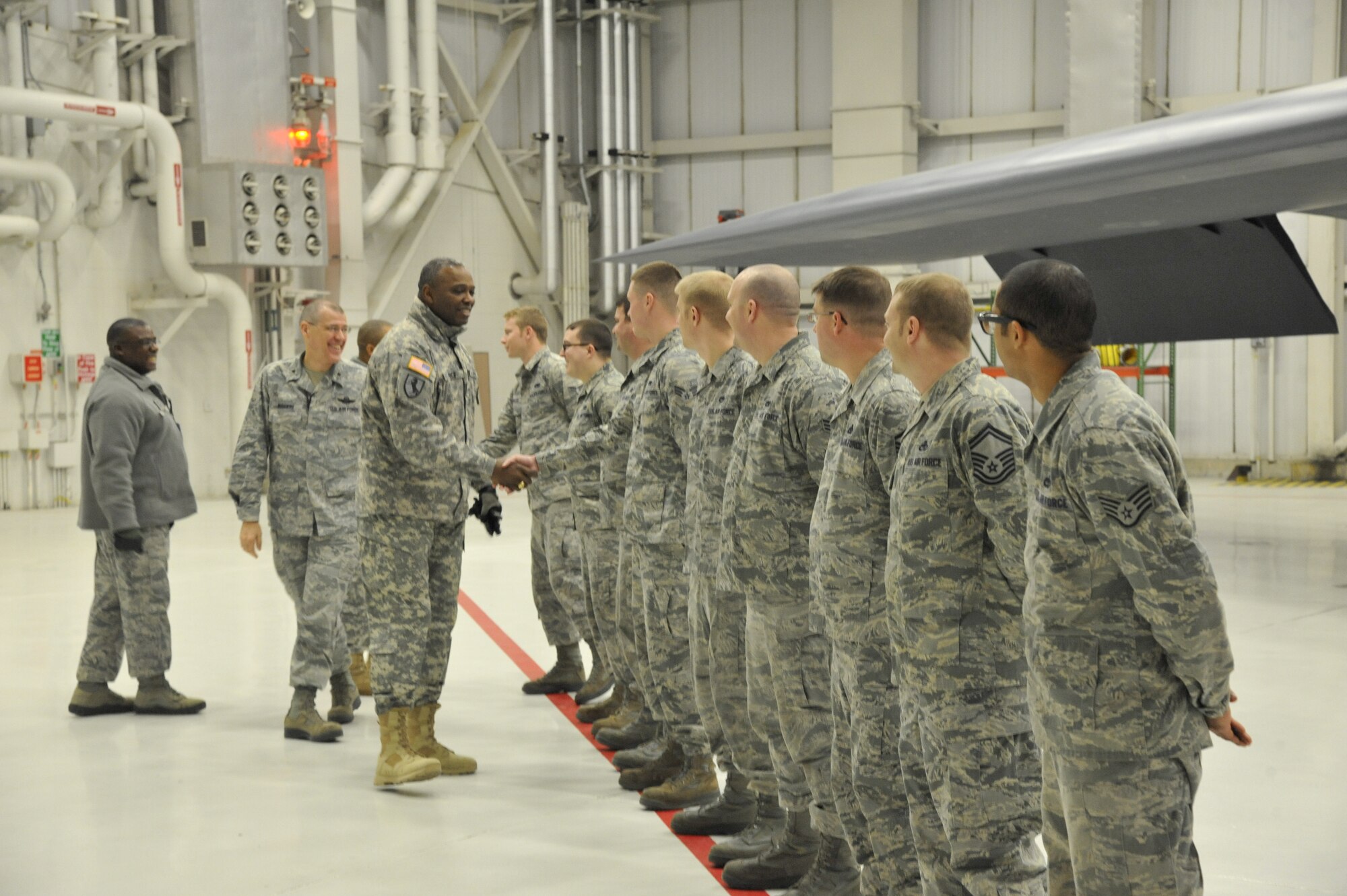 Brig. Gen. Barrye Price, U.S. Army Forces Command deputy chief of staff, speaks with the 509th Aircraft Maintenance Squadron/13th Aircraft Maintenance Unit at Whiteman Air Force Base, Mo., Jan. 29, 2014. During his tour, Price visited the 509th AMXS/13th AMU and the 509th Maintenance Group, and concluded with giving a speech at the Martin Luther King Luncheon. (U.S. Air Force photo by Airman 1st Class Keenan Berry/Released)