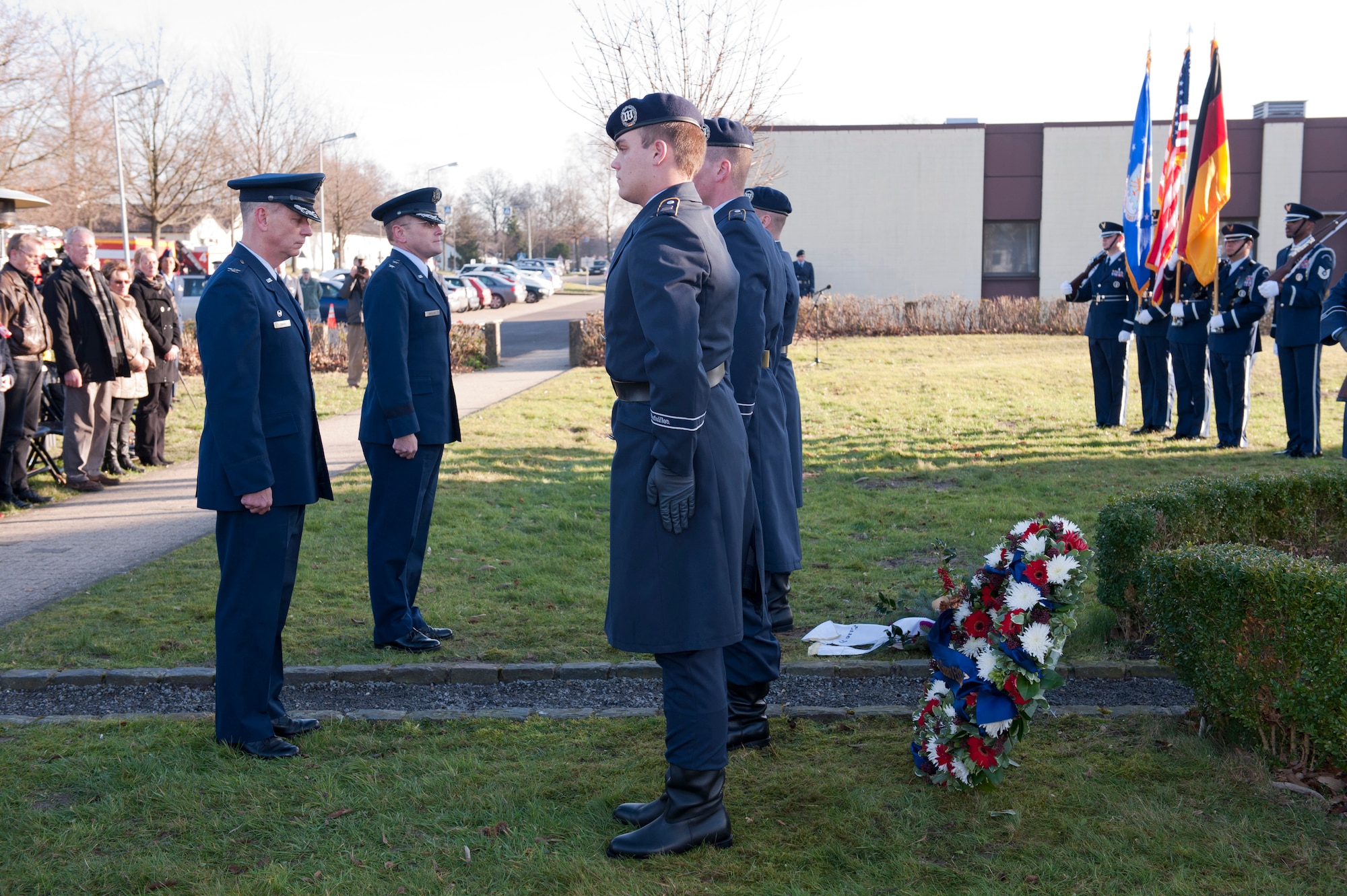 Maj. Gen. Andrew M. Mueller, Commander NATO E-3A Component, Geilenkirchen, Germany and Col. Daniel J. Swain, Commander 141st Air Refueling Wing, Fairchild AFB, WA, pay tribute to the Crew of "ESSO 77" as the Wachbataillon ( German Federal Drill Team) performs, Geilenkirchen, Germany, Jan. 10, 2014. The memorial pays tribute to four 141st Air Refueling Wing Airmen who lost their lives in a KC-135E Stratotanker crash  Jan. 13, 1999. (U.S. Air Force photo by Mr André Joosten/Released)