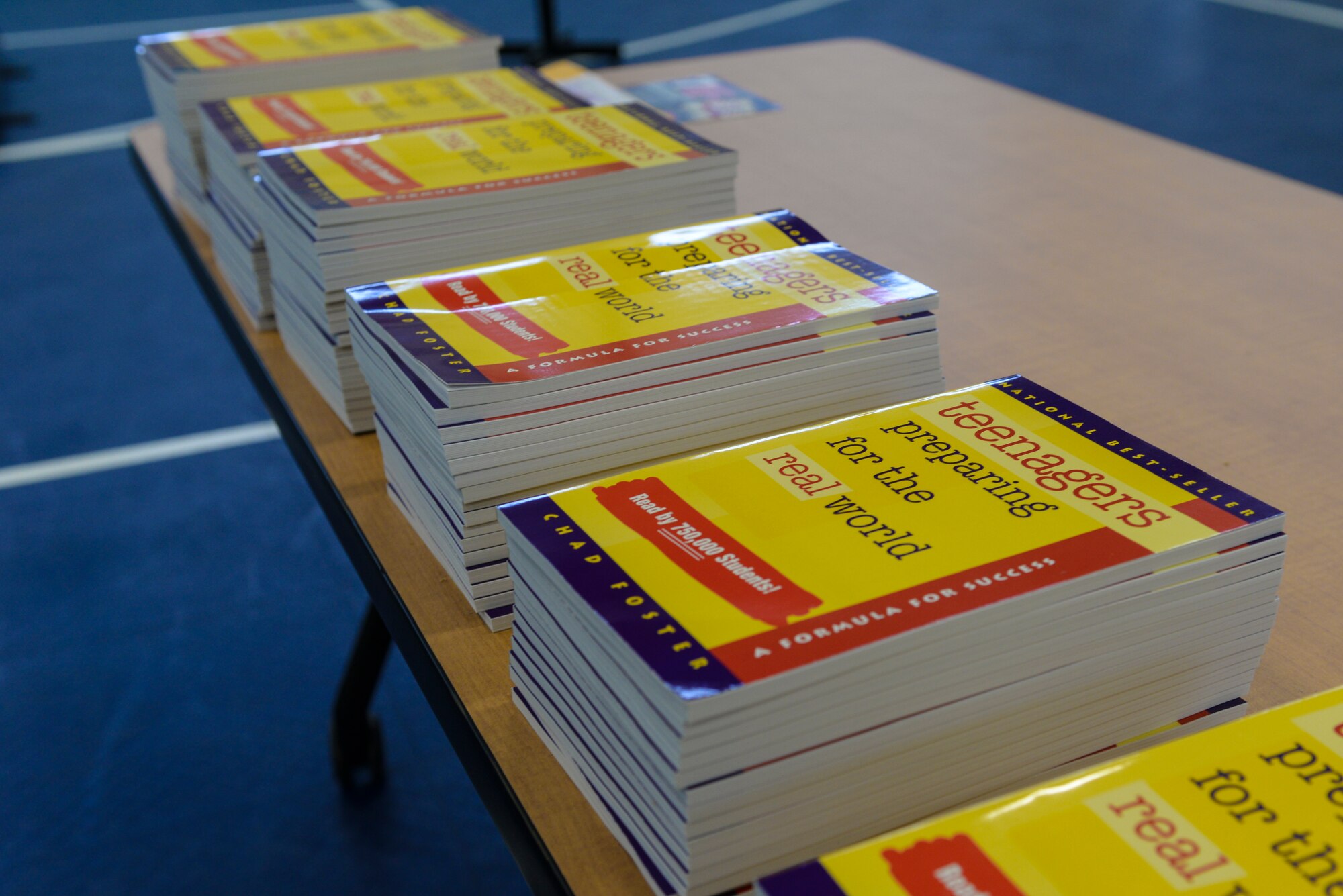 Stacks of books sit during a “Preparing Teens for the World” presentation at Moody Air Force Base, Ga., Feb. 1, 2014.  The event included a presentation concerning major issues that teenagers deal with on a daily basis. (U.S. Air Force Senior Airman Olivia Bumpers/Released)