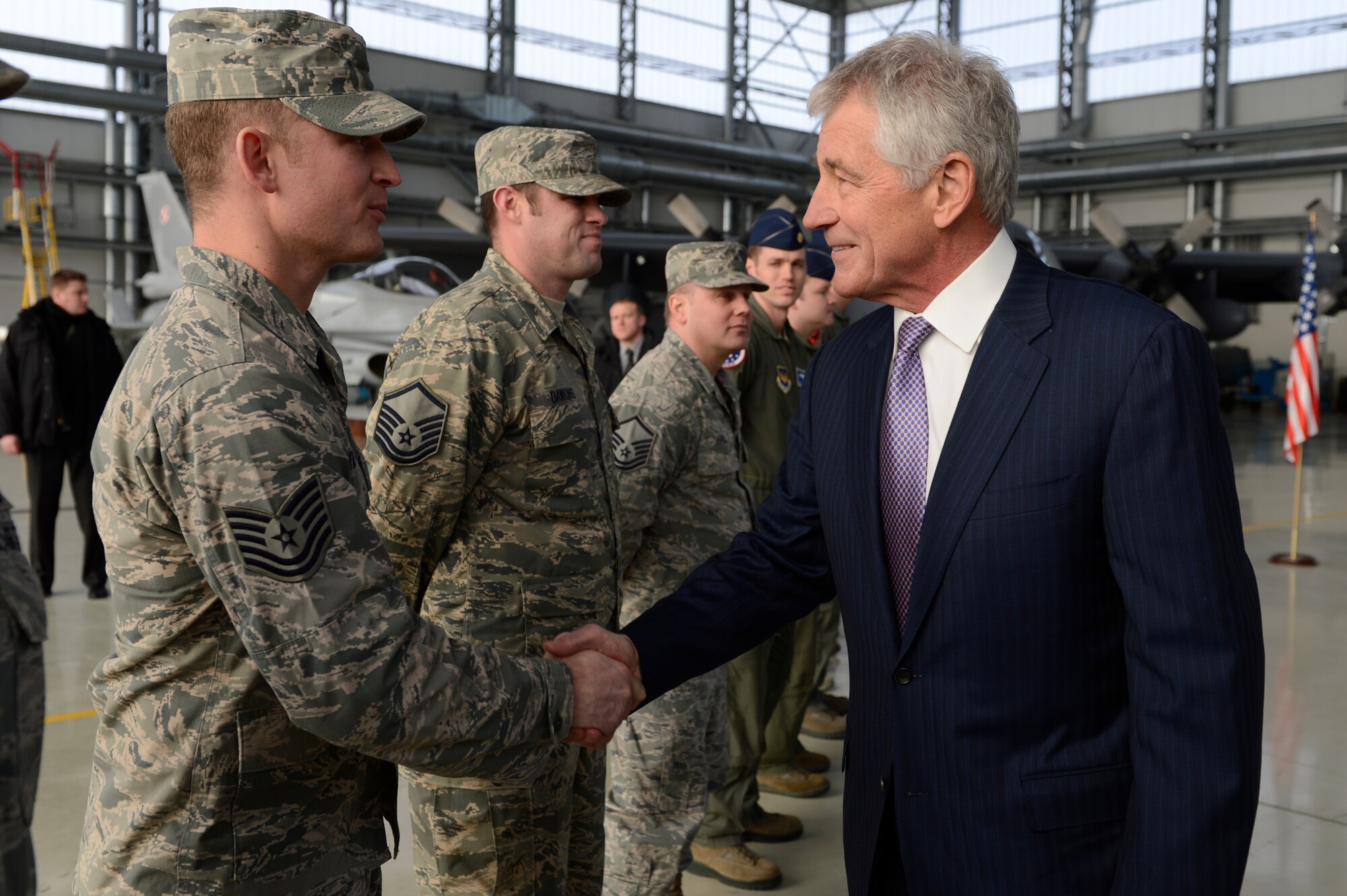 U.S. Tech. Sgt. Brian Williams, Aviation Detachment, 52nd Operations Group NCO in Charge of logistics planning from the hometown of Ocean Springs, Miss., receives a hand shake from U.S. Secretary of Defense Chuck Hagel Jan. 31, 2014, at Powidz Air Base, Poland. The Av-Det’s mission supports Poland’s continued defense modernization and standardization with the U.S. and the North Atlantic Treaty Organization.  (U.S. Air Force photo by Staff Sgt. Christopher Ruano)