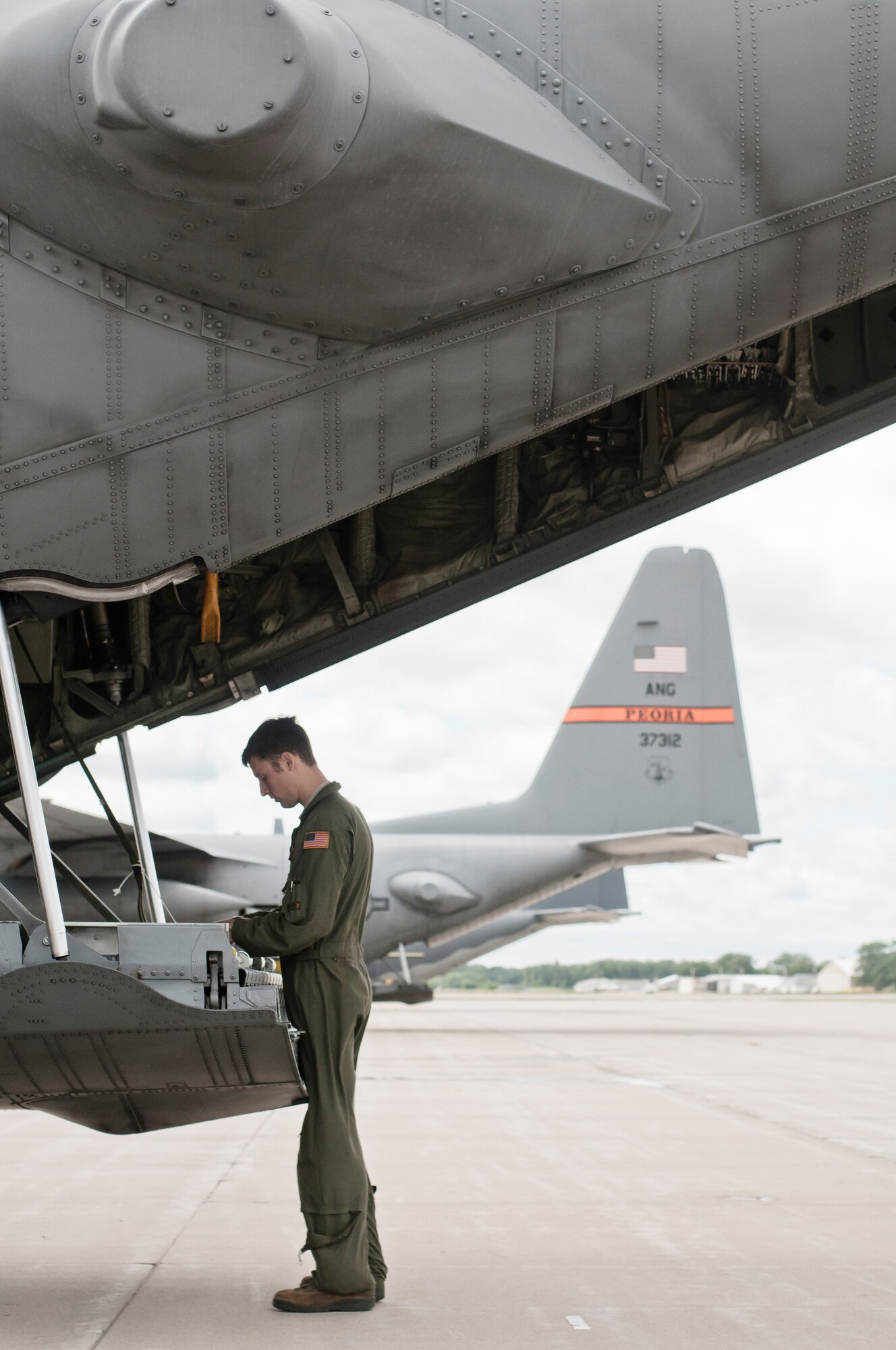 U.S. Air Force Senior Airman Nick J. Barth, an aircraft loadmaster with the 169th Airlift Squadron, packs a training bundle on a C-130 Hercules at Alpena, Mich., in support of Exercise Northern Strike 2013 on Aug. 7, 2013. Exercise Northern Strike 2013 is a joint multi-national combined arms training exercise conducted in northern Michigan. (U.S. Air National Guard photo by Master Sgt. Scott Thompson/released)