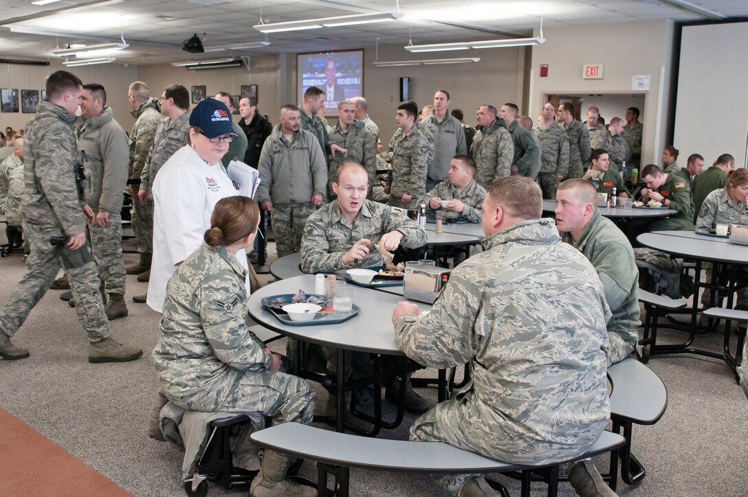 Evaluators from the Kenneth Disney Award examine the 182d Services Flight during a lunch service at the 182nd Airlift Wing, Peoria, Ill. on Feb. 1, 2014. The Services Flight was one of three units being evaluated for the award. (U.S. Air National Guard photo by Master Sgt. Scott Thompson (released))