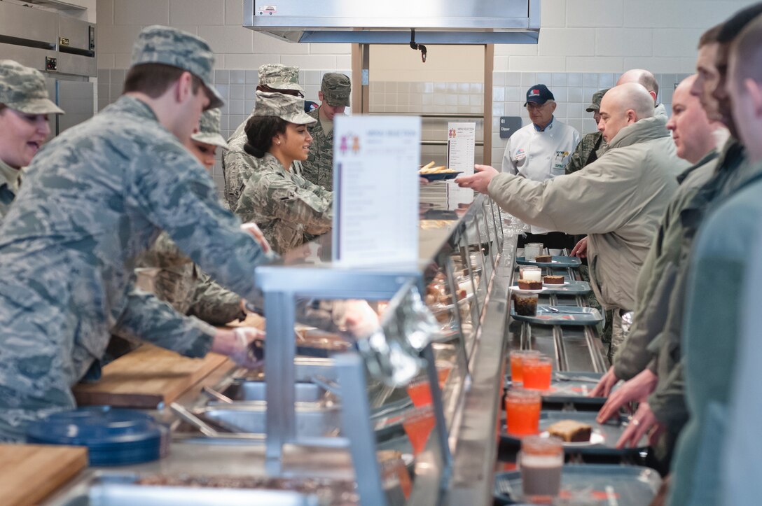 Evaluators from the Kenneth Disney Award examine the 182d Services Flight during a lunch service at the 182nd Airlift Wing, Peoria, Ill. on Feb. 1, 2014. The Services Flight was one of three units being evaluated for the award. (U.S. Air National Guard photo by Master Sgt. Scott Thompson (released))