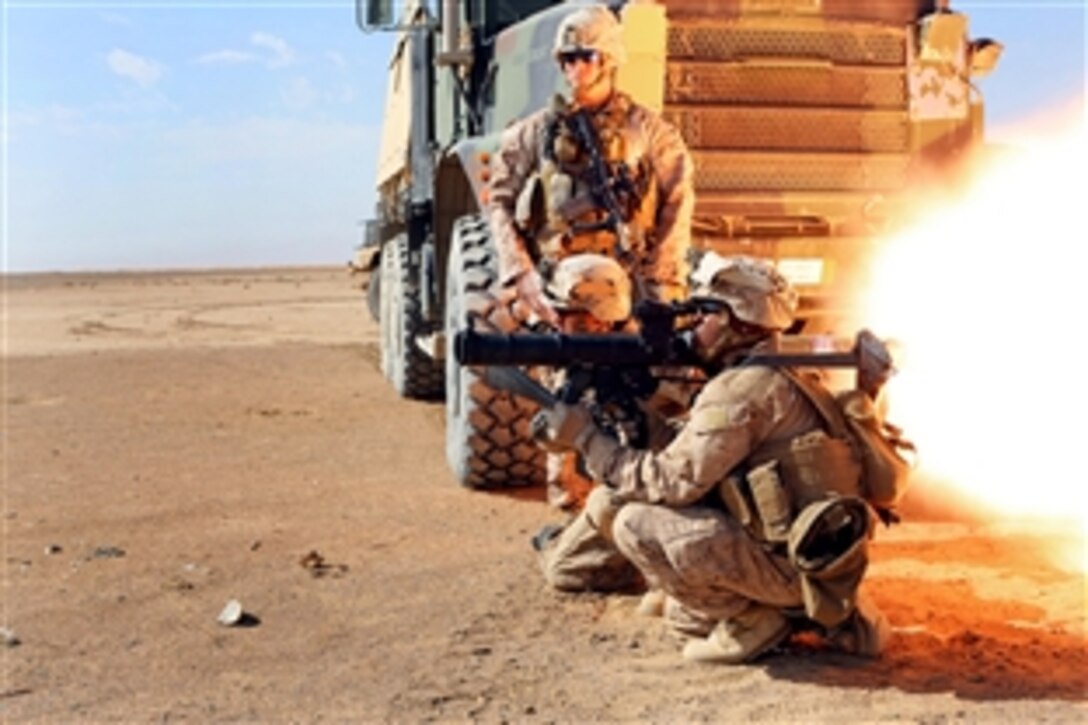 A U.S. Marine fires a shoulder mounted rocket during rocket range training outside of Camp Leatherneck in Helmand province, Afghanistan, Jan. 31, 2014.