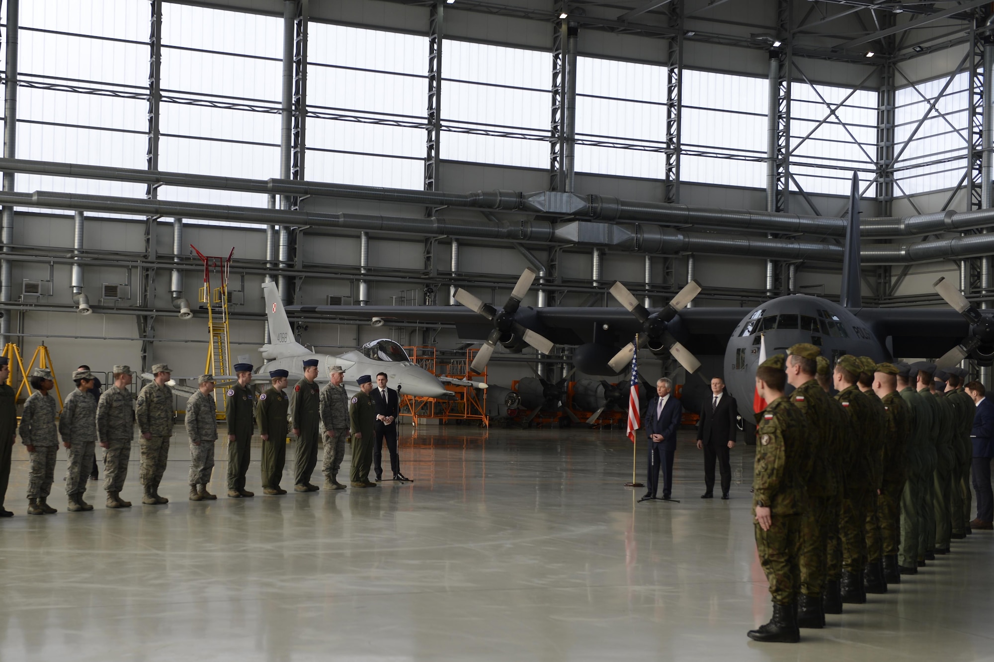 Secretary of Defense Chuck Hagel thanks Airmen from the 52nd Fighter Wing’s Aviation Detachment and Polish airmen Jan. 31, 2014, at Powidz Air Base, Poland. The detachment's mission enhances U.S. bilateral defense ties and demonstrates its enduring partnership with Poland. (U.S. Air Force photo/Staff Sgt. Christopher Ruano)