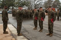 Promoted and awarded Marines salute the Headquarters and Service Battalion commanding officer during a U.S. Marine Corps Forces Command formation Feb. 3, 2014. Visit http://www.flickr.com/photos/marforcom/sets/72157640472653764/ for additional photos.