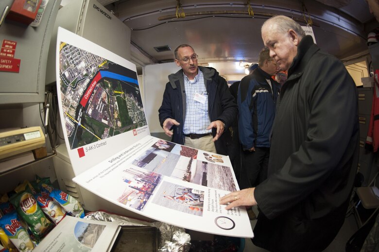 Under Secretary of the Army Joseph W. Westphal (front) receives a briefing aboard the U.S. Army Corps of Engineer vessel HAYWARD during a visit with the New York District to observe the progress of the New York and New Jersey Harbor Deepening Project in January 2014. Westphal met with leaders from the U.S. Army Corps of Engineers, North Atlantic Division and New York District to receive various updates regarding the Corps’ efforts post Hurricane Sandy and observe the Corps’ oversight of vital civil works projects. Once complete, the deepened channel will provide a safe and economically efficient pathway for the newest generation of container ships that will be calling at the Port of New York and New Jersey following the completion of the Panama Canal expansion in 2015.

Photo Credit: U.S. Army Staff Sergeant Bernardo Fuller 
