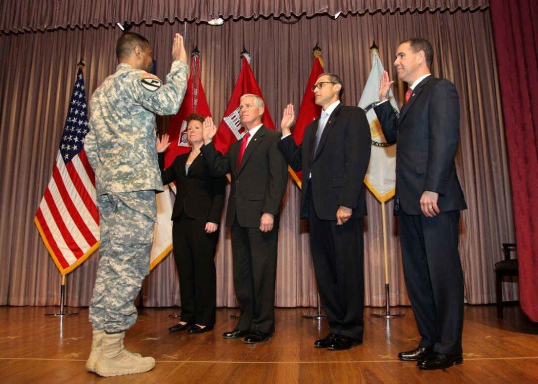 Pete Perez, the Southwestern Division director, regional business directorate, is inducted into the Senior Executive Service, Jan. 30, 2014 in Washington, DC.