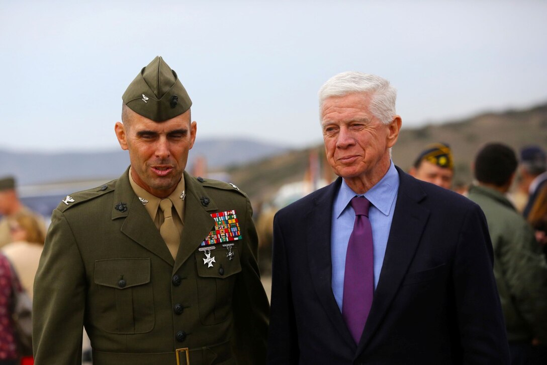 Colonel Peter Baumgarten, commanding officer, 1st Marine Regiment, and a native of El Paso, Texas, left, thanks retired Gen. Joseph Hoar, former commanding officer of the regiment, and a native of Boston, for attending the regiment’s 100-year anniversary ceremony as the guest of honor aboard Camp Pendleton, Calif., Jan. 24, 2014. Gen. Hoar commanded of the regiment in 1979 through 1981. His personal decorations include the Defense Distinguished Service Medal, the Bronze Star Medal with combat “V” and gold star, and the Meritorious Service Medal with gold star.