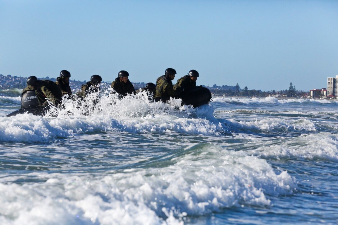 Soldiers with the Japan Ground Self-Defense Force conduct surf passages on a Combat Rubber Reconnaissance Craft as part of reconnaissance training with the Expeditionary Warfare Training Group Pacific during Exercise Iron Fist 2014 aboard Naval Amphibious Base Coronado, Calif., Feb. 3, 2014. Iron Fist is an amphibious exercise that brings together Marines and sailors from the 15th Marine Expeditionary Unit, other I Marine Expeditionary Force units, and soldiers from the JGSDF, to promote military interoperability and hone individual and small-unit skills through challenging, complex and realistic training. (U.S. Marine Corps photo by Lance Cpl. Ricardo Hurtado/Released)