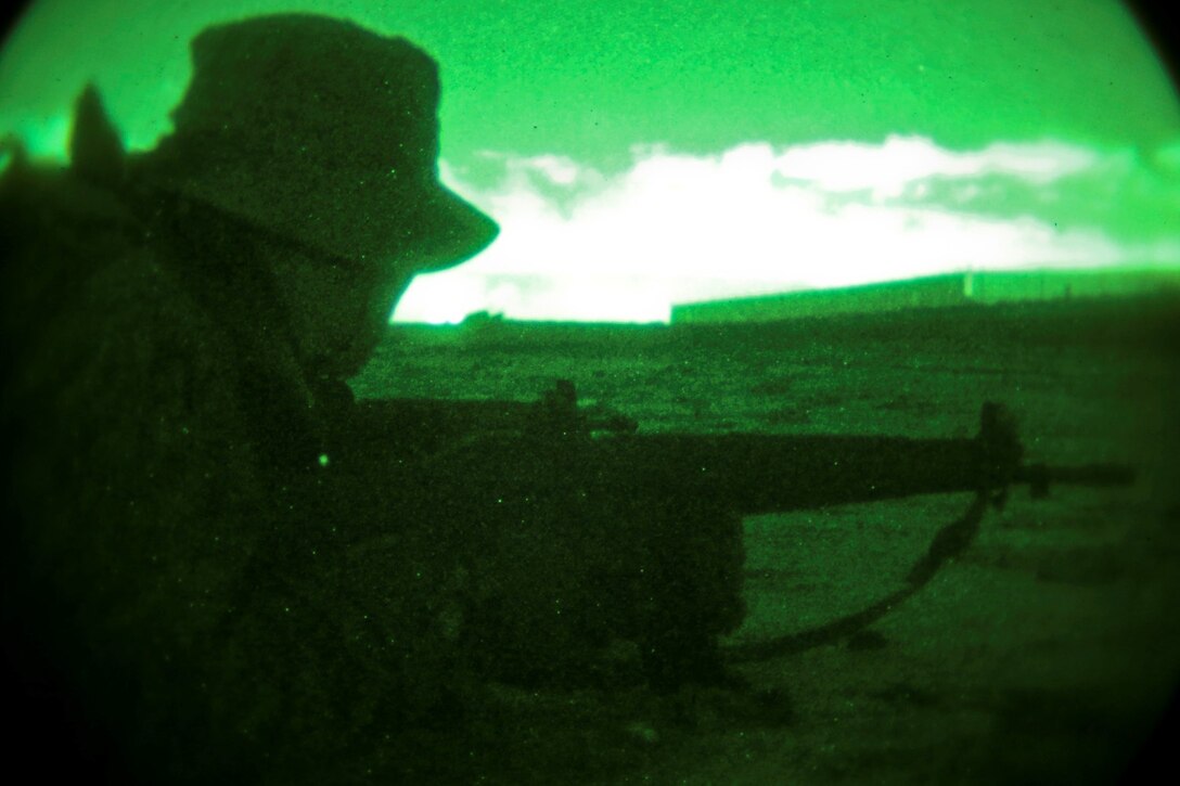 A soldier with the Japan Ground Self-Defense Force posts security while conducting an amphibious raid as part of reconnaissance training with the Expeditionary Warfare Training Group Pacific during Exercise Iron Fist 2014 aboard Naval Amphibious Base Coronado, Calif., Feb. 3, 2014. Iron Fist is an amphibious exercise that brings together Marines and sailors from the 15th Marine Expeditionary Unit, other I Marine Expeditionary Force units, and soldiers from the JGSDF, to promote military interoperability and hone individual and small-unit skills through challenging, complex and realistic training. (U.S. Marine Corps photo by Lance Cpl. Ricardo Hurtado/Released)