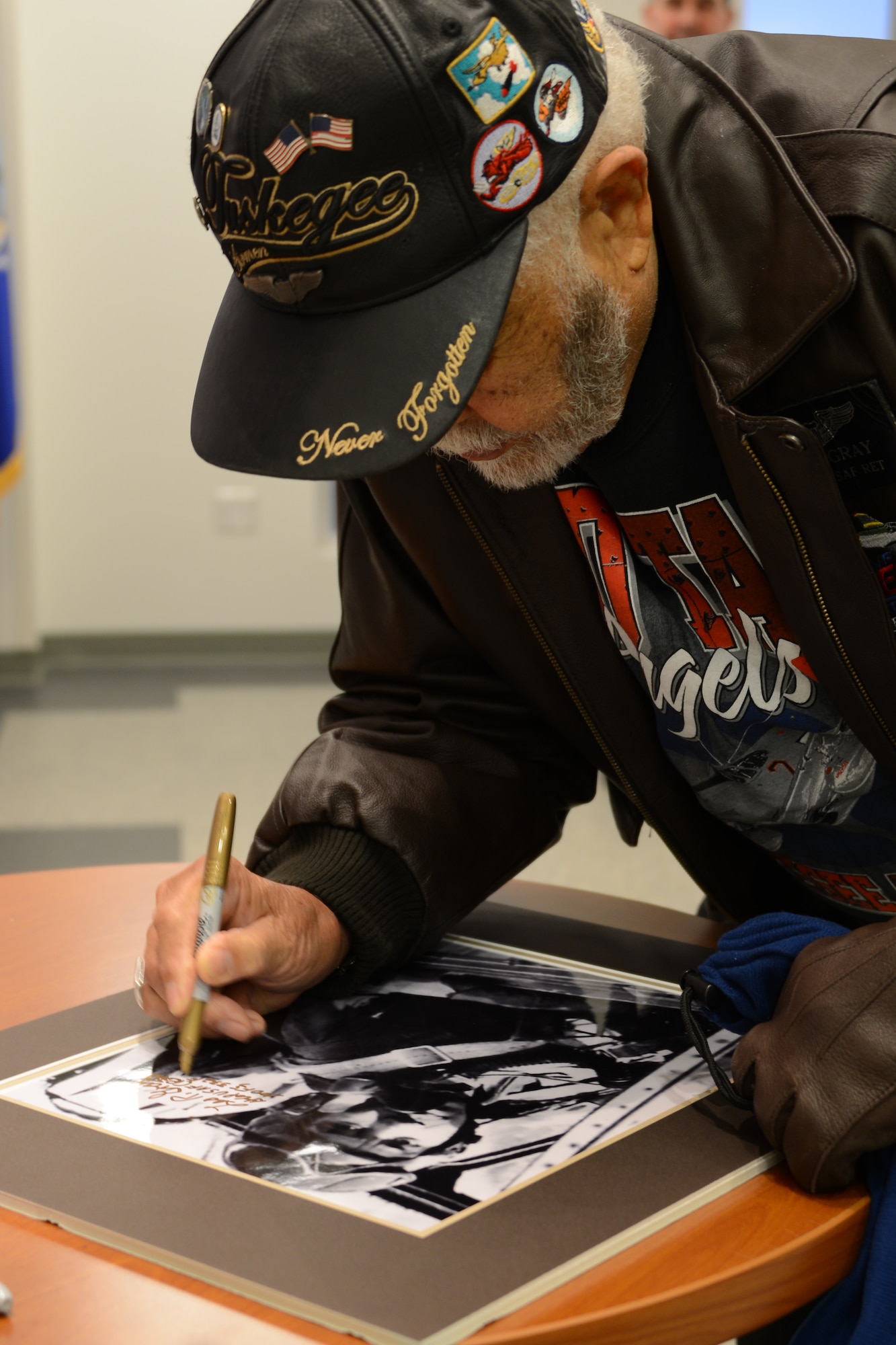 An original Tuskegee Airman, retired Lt. Col. Leo R. Gray, a P-51 pilot assigned to the 100th Pursuit Squadron during World War II had the chance to visit with the Airmen of the 477th Fighter Group that are continuing the Tuskegee legacy of excellence here Jan. 31 (U.S. Air Force/Tech. Sgt. Dana Rosso)