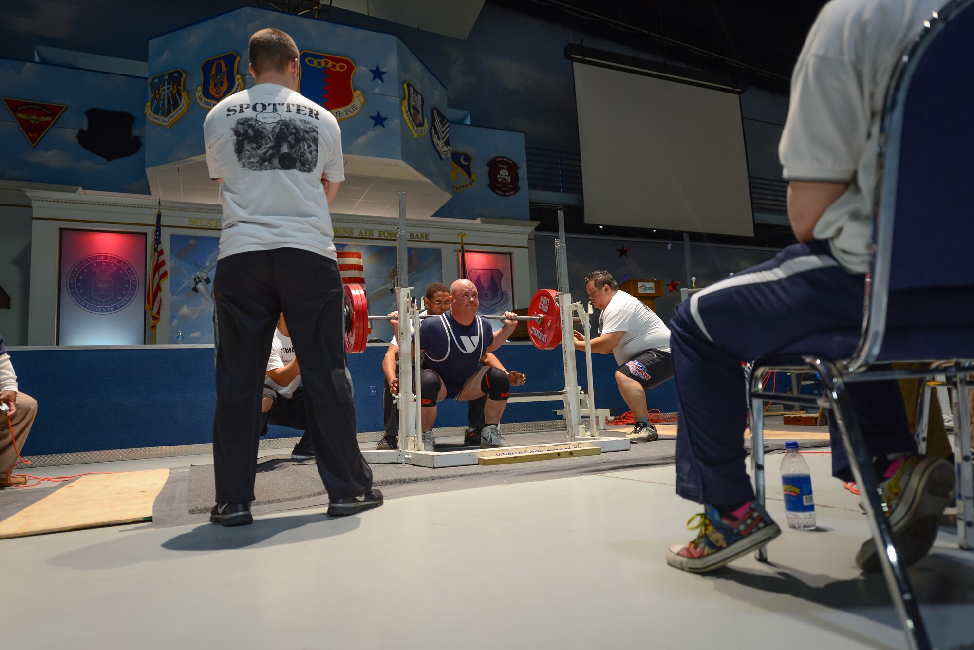 U.S. Air Force Tech. Sgt. Michael Lloyd of the 165th Airlift Wing, Georgia Air National Guard attempts a squat, Jan. 25, 2014, at the Museum of Aviation in Warner Robins, Ga. Lloyd broke four U.S.A. Powerlifting Georgia state records at the 2014 Winter Classic and Single Ply Invitational. He set a record for squat, bench press, three event total (squat, bench press, deadlift), and bench press only for the Masters Division in his weight class at his first powerlifting competition. (U.S. Air National Guard photo by Master Sgt. Charles Delano/Released)