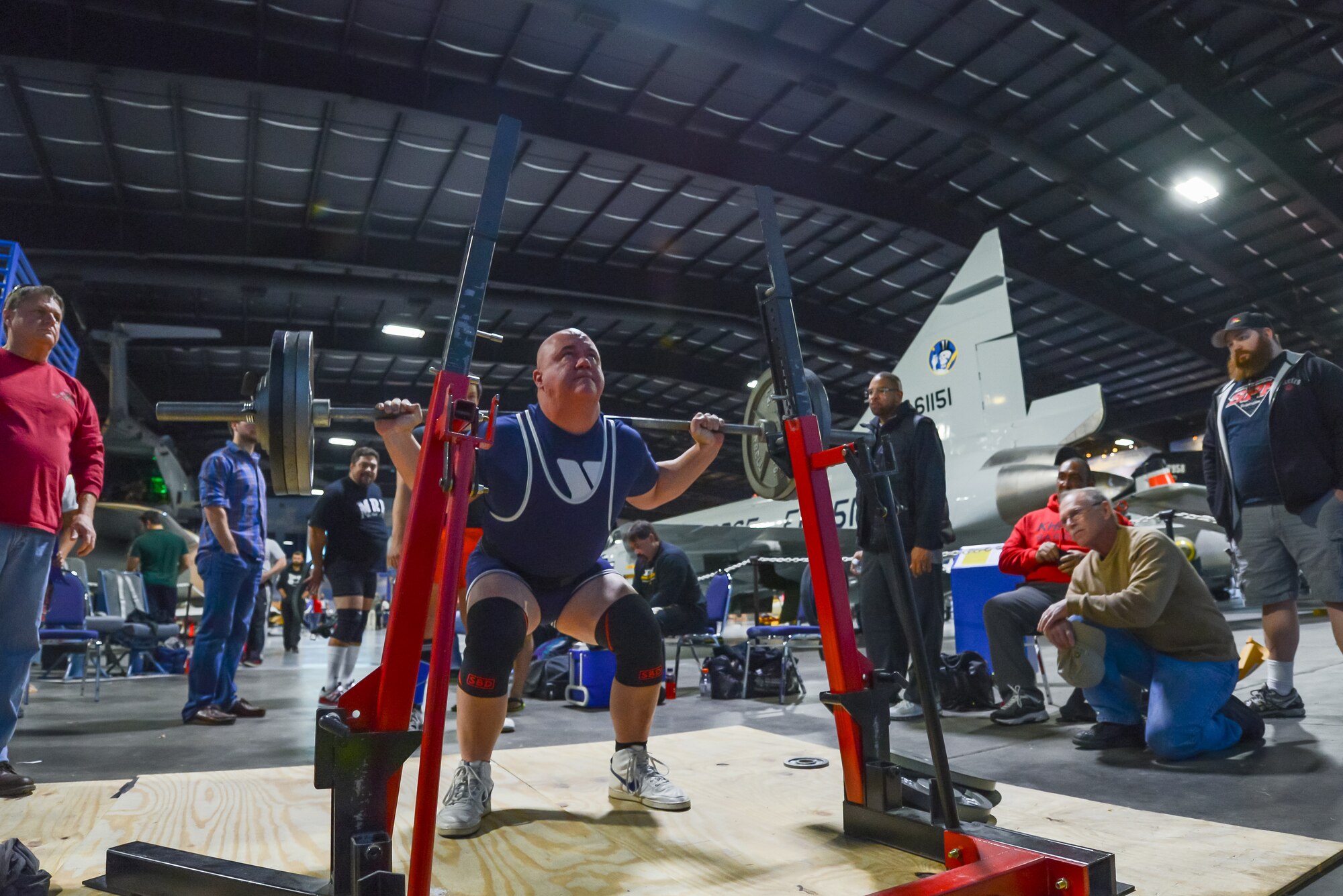 U.S. Air Force Tech. Sgt. Michael Lloyd of the 165th Airlift Wing, Georgia Air National Guard practices a squat, Jan. 25, 2014, at the Museum of Aviation in Warner Robins, Ga. Lloyd broke four U.S.A. Powerlifting Georgia state records at the 2014 Winter Classic and Single Ply Invitational. He set a record for squat, bench press, three event total (squat, bench press, deadlift), and bench press only for the Masters Division in his weight class at his first powerlifting competition. (U.S. Air National Guard photo by Master Sgt. Charles Delano/Released)