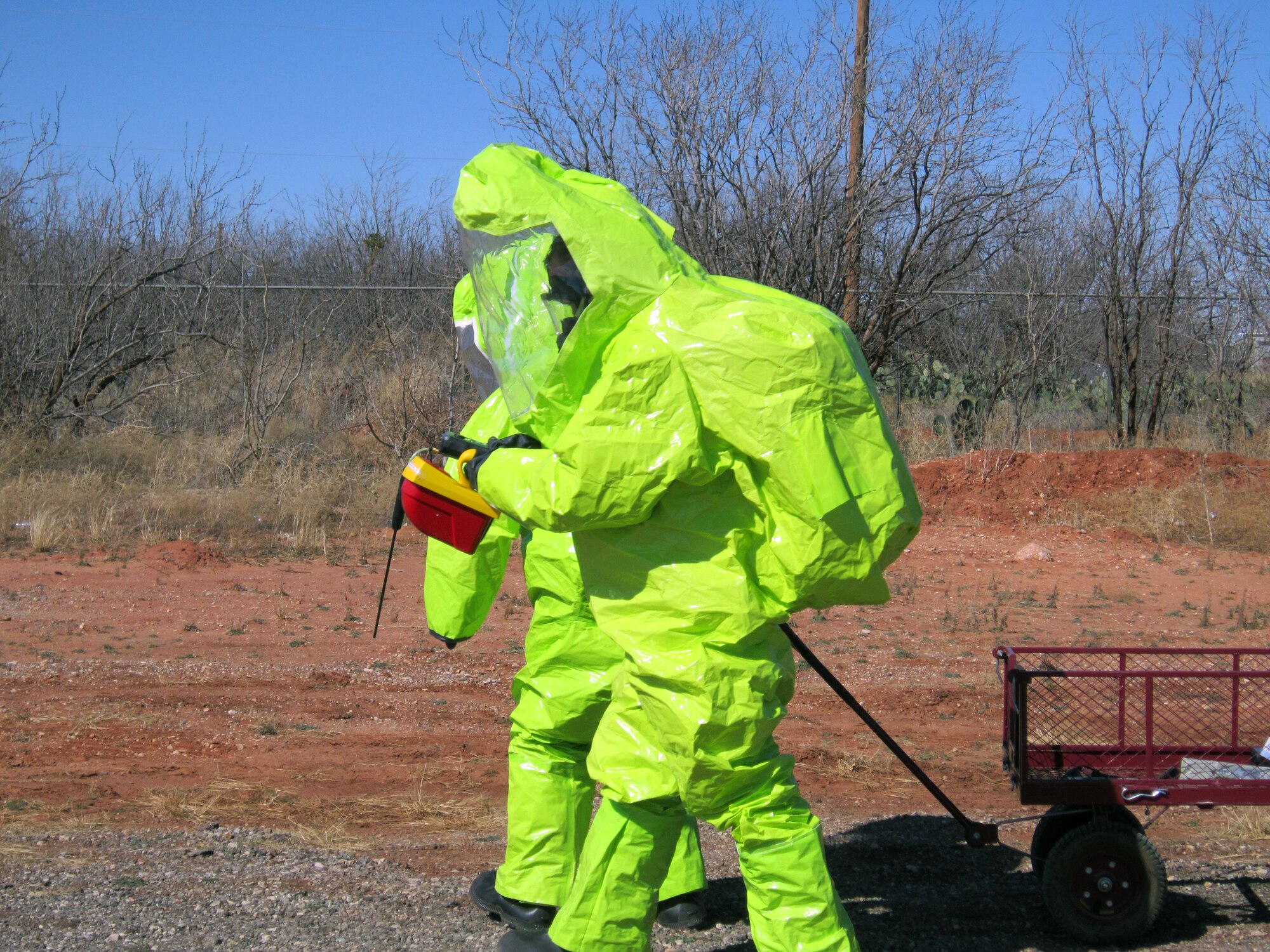 U.S. Air Force Staff Sgt. Michael Dodd, left, and Airman 1st Class Alexandria Burwell, both from the 7th Aerospace Medical Squadron, use a radiation detection device and an atmospheric monitor to detect contaminants in the air as well as oxygen concentration during the 2013 Integrated Base Emergency Response Capabilities Training (IBERCT) Feb. 28, 2013, at Dyess Air Force Base, Texas. The exercises focused on all hazard responses to chemical, biological, radiological, nuclear and explosive (CBRNE) materials with the objective of identifying, analyzing, and controlling hazards. (Courtesy photo)
