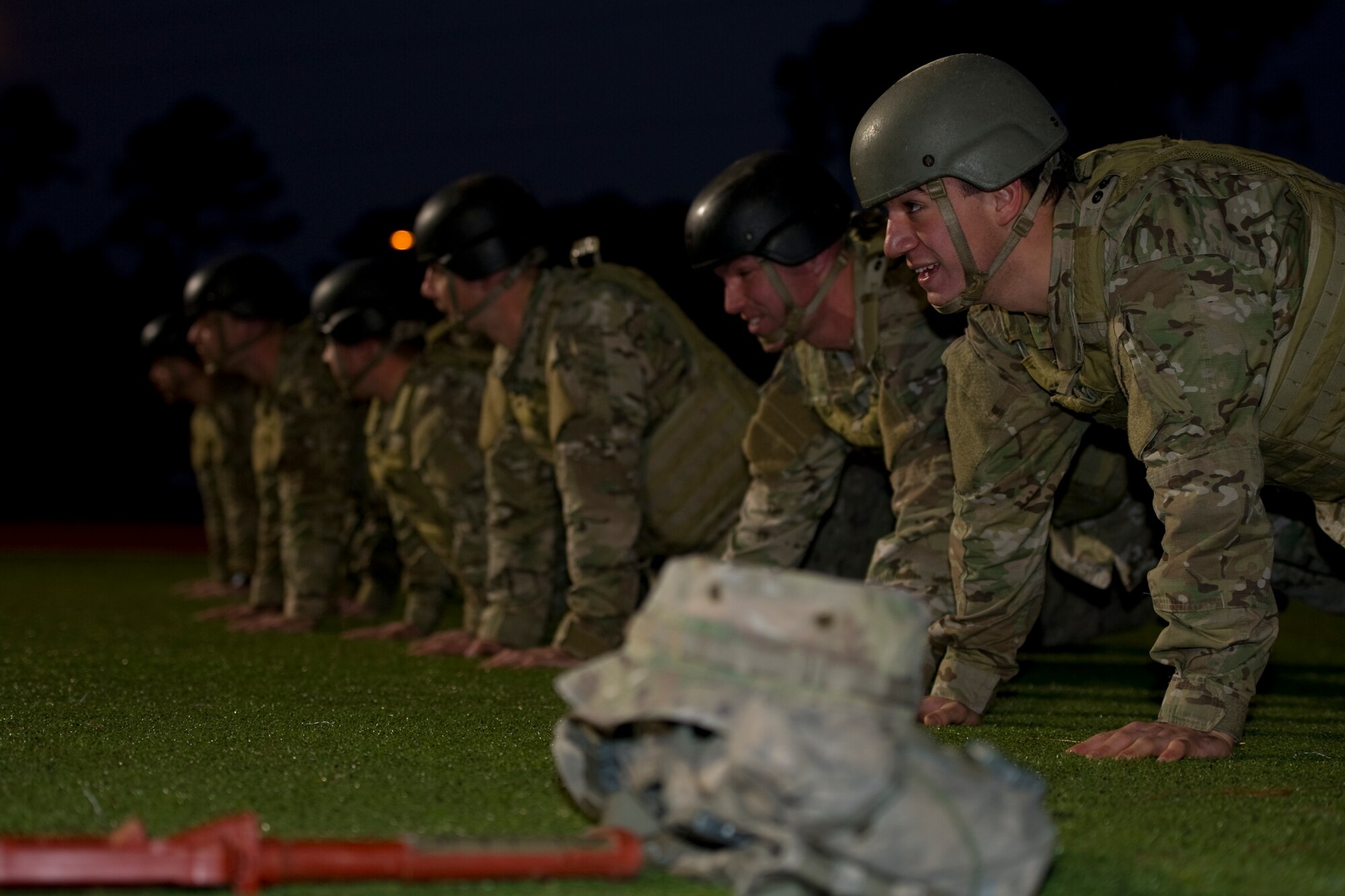 Tactical Air Control Party candidates from Hawk Flight 94, Detachment 3, 342nd Training Squadron, rest in the front leaning position on the track at Hurlburt Field, Fla., Feb. 4, 2014. Det. 3 trains Airmen to directly assist, control, enable and execute operational air and space power functions in a deployed environment.  (U.S. Air Force photo/Senior Airman Naomi Griego)