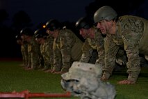 Tactical Air Control Party candidates from Hawk Flight 94, Detachment 3, 342nd Training Squadron, rest in the front leaning position on the track at Hurlburt Field, Fla., Feb. 4, 2014. Det. 3 trains Airmen to directly assist, control, enable and execute operational air and space power functions in a deployed environment.  (U.S. Air Force photo/Senior Airman Naomi Griego)