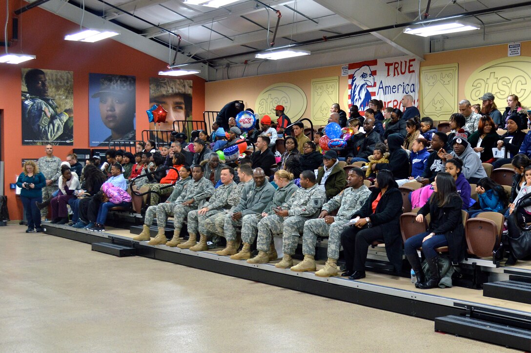 U.S. Army Soldiers from 4th Platoon, 510th Human Resources Company, Special Troops Battalion, 7th Transportation Brigade (Expeditionary), return home to Fort Eustis, Va., Jan. 31, 2014, after a nine-month tour of duty in Afghanistan. The ‘Regulators’ were responsible for casualty liaison operations, including reporting, assistance and notification. Additional duties included ensuring the safety of distinguished visitors in their area of responsibility.  (U.S. Army photo by Sgt. Stefanie Warner/Released)
