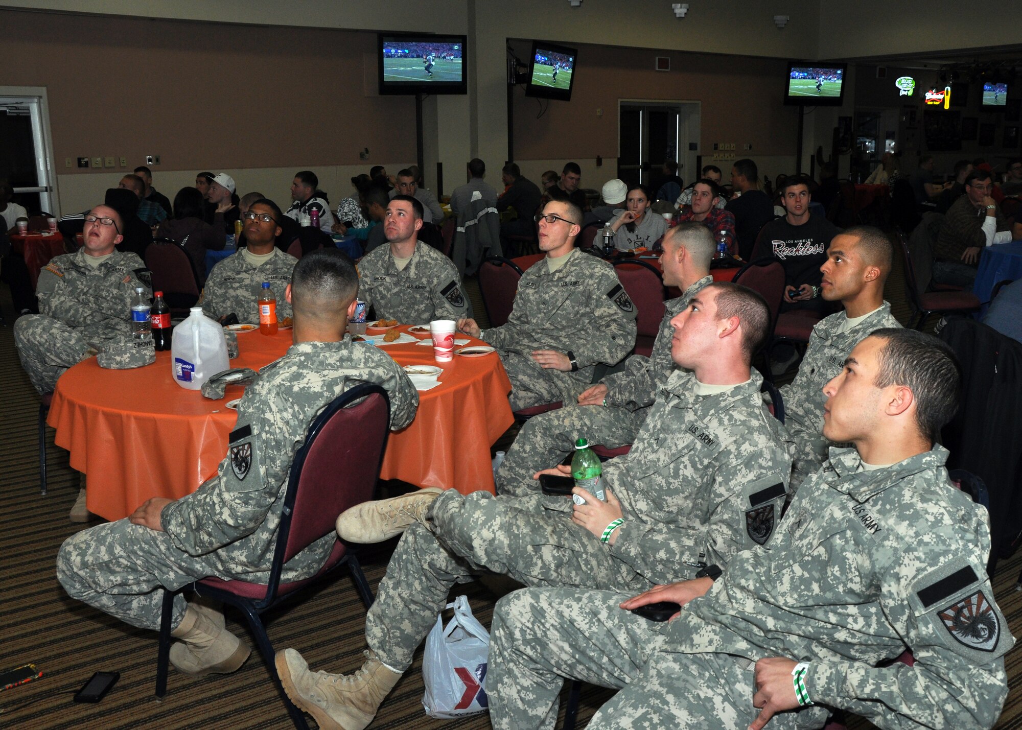 GOODFELLOW AIR FORCE BASE, Texas – Soldiers watch the Denver Broncos compete against the Seattle Seahawks during a Super Bowl XLVIII party at the Event Center Feb. 2. Seattle Seahawks fans had a reason to go home happy after beating the Denver Broncos 43-8. (U.S. Air Force photo/ Senior Airman Joshua Edwards)