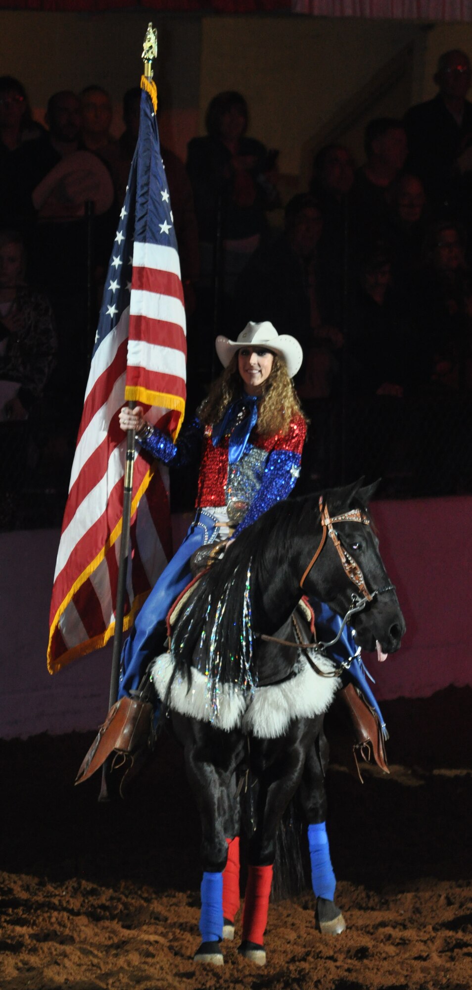 It was an exciting day at Fort Worth Stock Show and Rodeo's Military Appreciation Day. Member of the 301st Fighter Wing rode in the rodeo's grand entry prior to enjoying the sights and sounds of this historic annual event. (U.S. Air Force photo/Master Sgt. Julie Briden-Garcia)