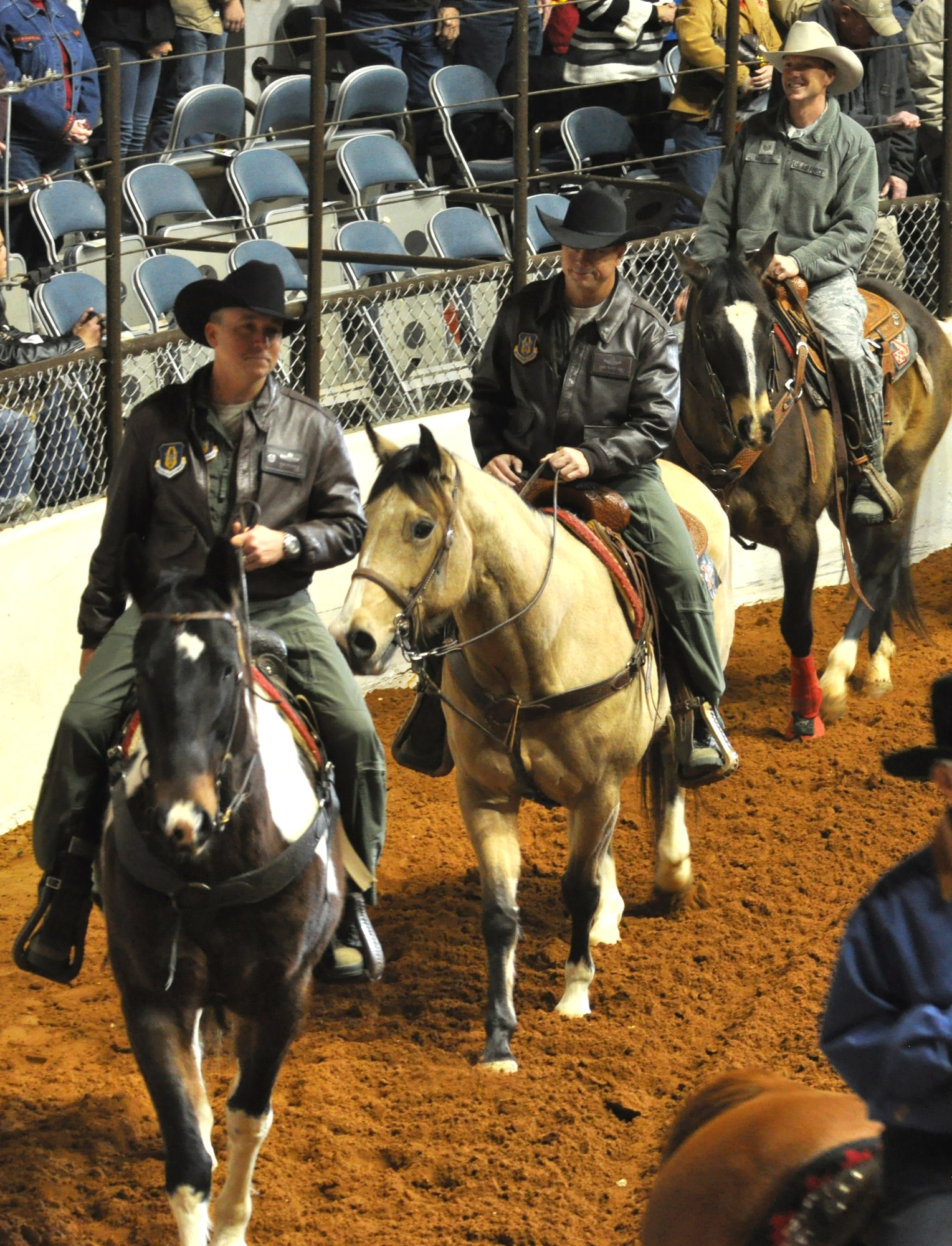 It was an exciting day at Fort Worth Stock Show and Rodeo's Military Appreciation Day yesterday. Col. John Breazeale, 301st Fighter Wing commander, Col. Chris Yancy, 301st FW vice commander, and Tech. Sgt. Larry Marsh, 301st FW's 2013 NCO of the Year, rode in the grand entry prior to enjoying the sights and sounds of this historic annual event. (U.S. Air Force photo/Master Sgt. Julie Briden-Garcia)