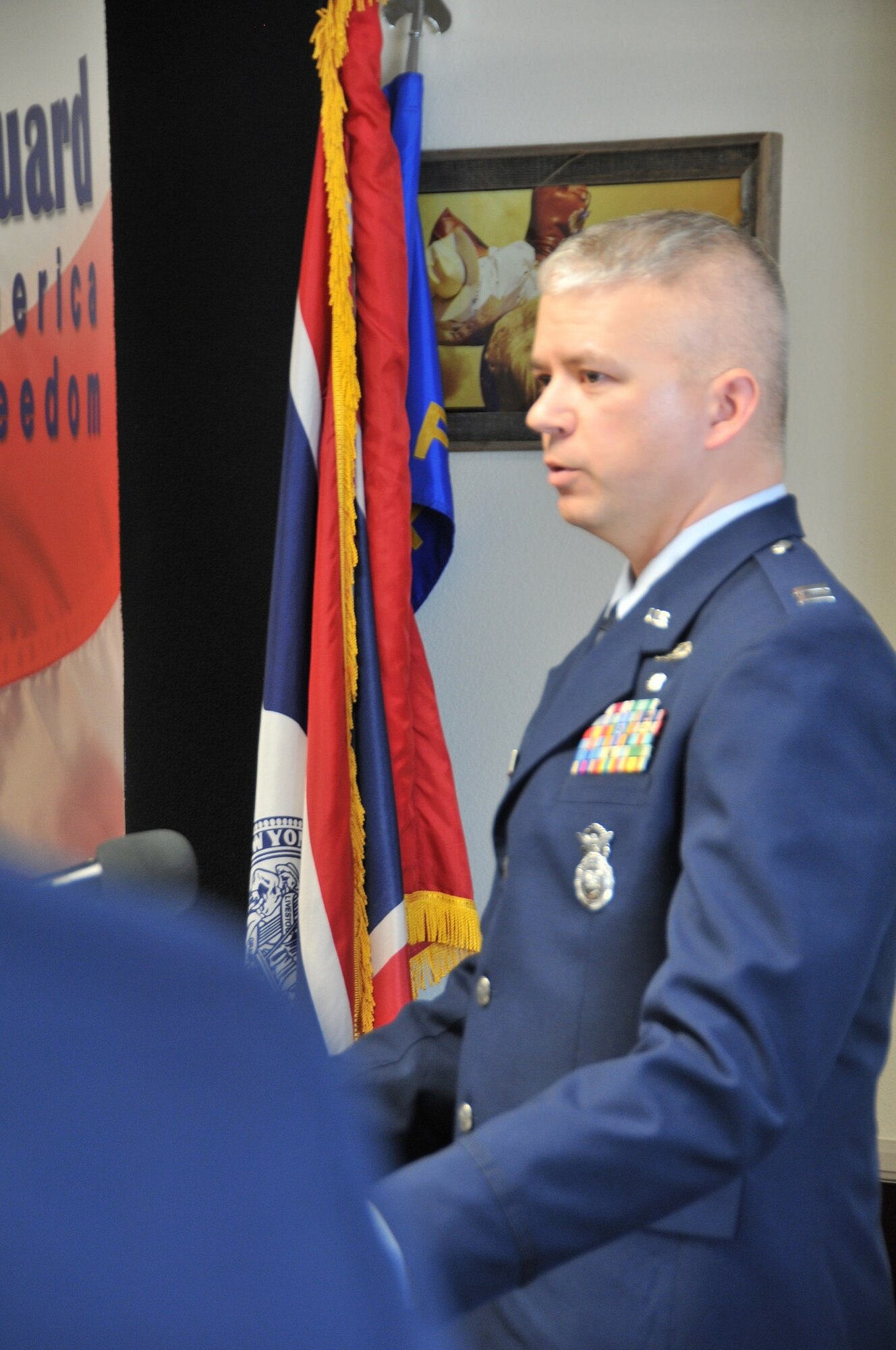 Air Force Capt. Sean DeVeau, incoming 153rd Security Forces Squadron commander, addresses the audience at the 153rd SFS change of command ceremony Feb. 2, 2014, Cheyenne, Wyo. (U.S. Air National Guard photo by Capt. Rusty Ridley)