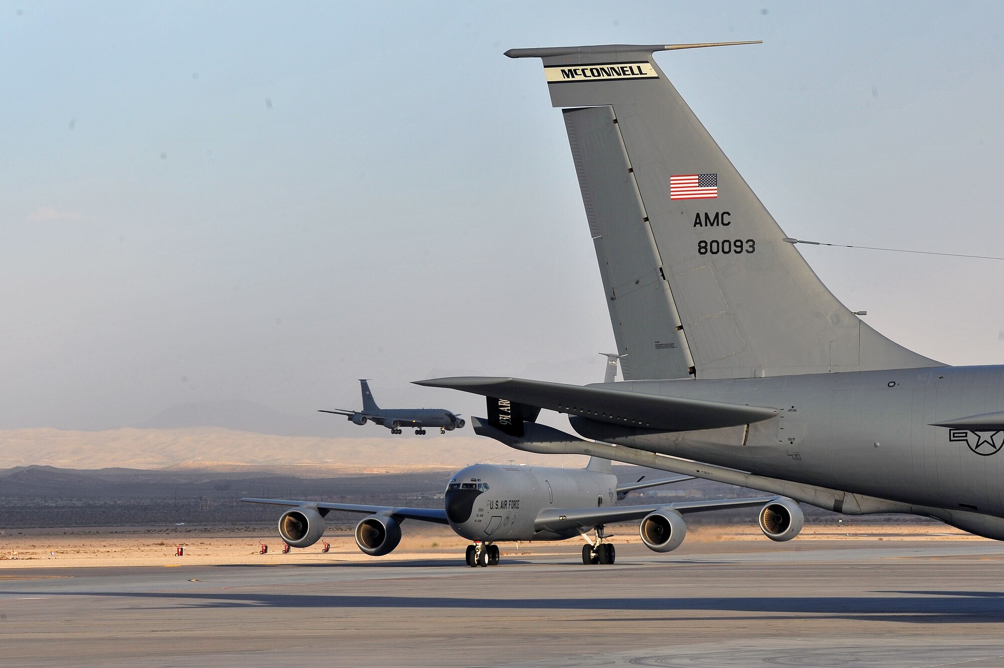 A KC-135 Stratotanker from Fairchild Air Force Base, Wash., taxis into a spot after landing at Nellis AFB, Nev., during Red Flag 14-1 Jan. 30, 2014. Red Flag has been expanded to incorporate all spectrums of warfare to include command and control, real-time intelligence, analysis and exploitation, and electronic warfare. (U.S. Air Force photo by Staff Sgt. Veronica Montes)