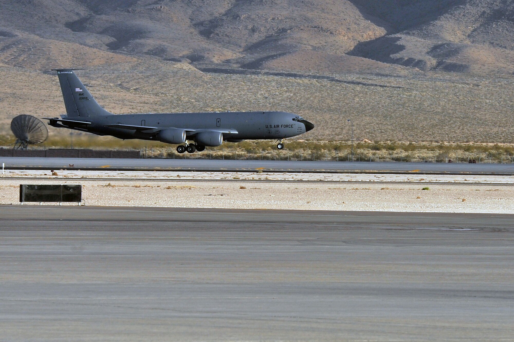 A KC-135 Stratotanker from Fairchild Air Force Base, Wash., lands on the runway at Nellis AFB, Nev., during Red Flag 14-1 Jan. 30, 2014. Red Flag is a realistic combat training exercise that incorporates air, space and cyber forces as part of the blue forces and their adversaries, the red forces. (U.S. Air Force photo by Staff Sgt. Veronica Montes) 