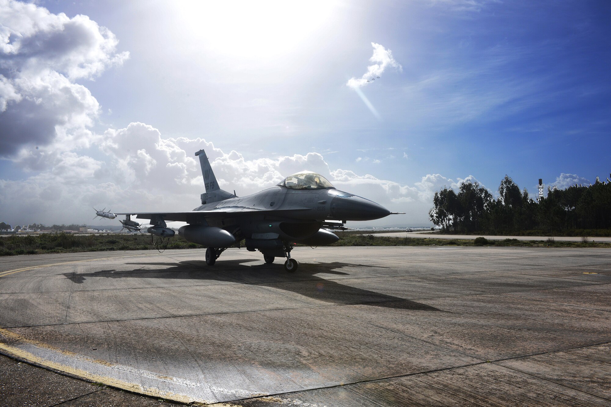 A U.S. F-16 Fighter Falcon arrives at Monte Real Air Base, Portugal Feb. 3 in support of REAL THAW 14, a two-week close air support exercise hosted by the Portuguese Air Force. Comparable to Operation Red Flag hosted at Nellis Air Force Base, Nevada, REAL THAW 14 will attract approximately 4,000 military personnel and 44 aircraft from the U.S., Netherlands, Portugal and NATO. (U.S. Air Force photo/2nd Lt. Allie Delury)
