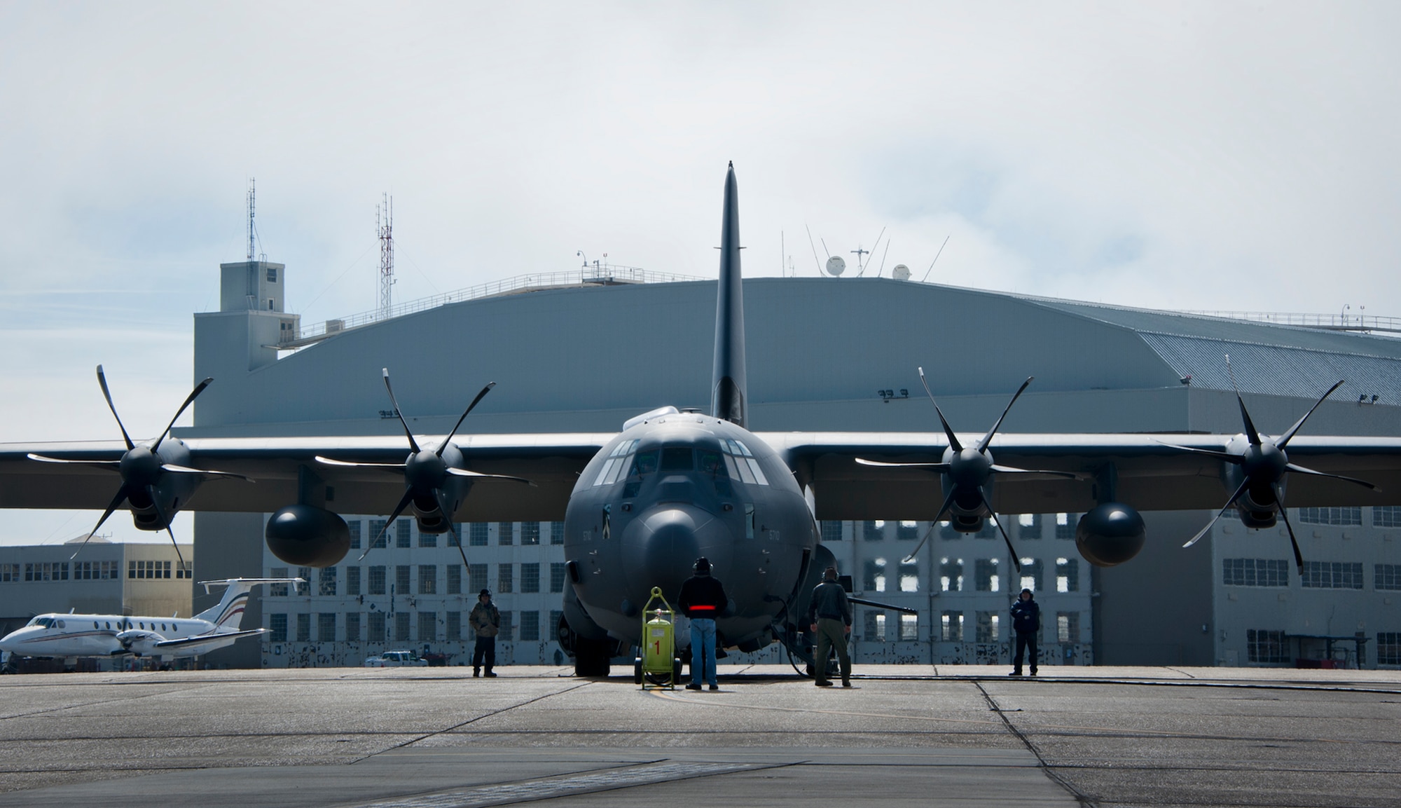 The aircrew from Eglin’s 413th Flight Test Squadron readies the newly created AC-130J Ghostrider for its first official sortie Jan. 31 at Eglin Air Force Base, Fla. The Air Force Special Operations Command MC-130J arrived at Eglin in January 2013 to begin the modification process for the AC-130J, whose primary mission is close air support, air interdiction and armed reconnaissance. A total of 32 MC-130J prototypes will be modified as part of a $2.4 billion AC-130J program to grow the future fleet. (U.S. Air Force photo/Sara Vidoni)