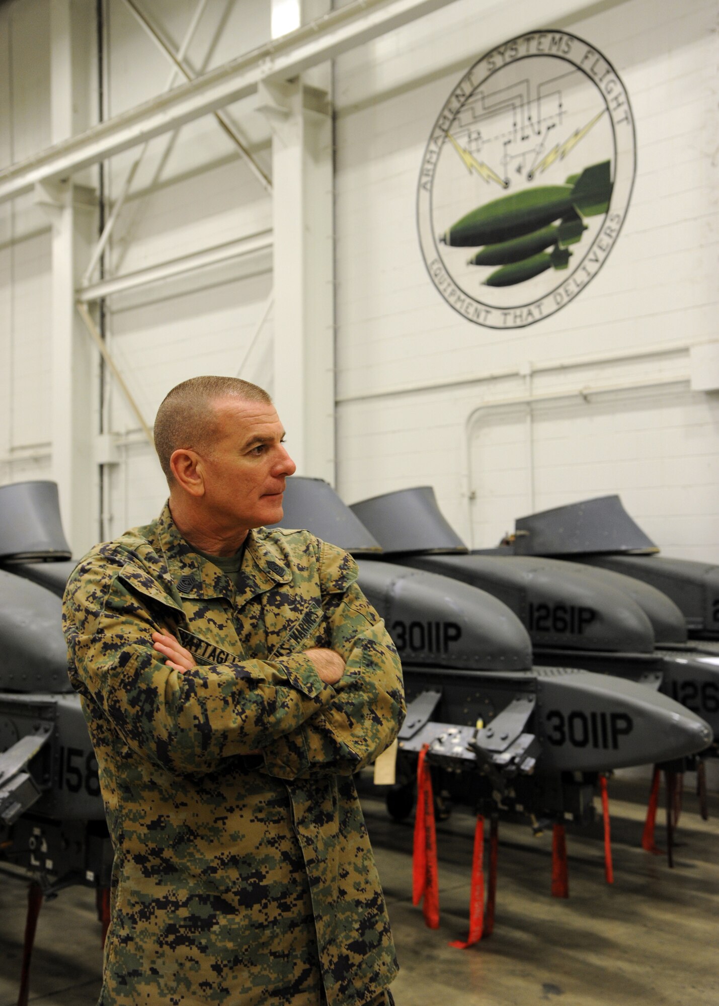 U.S. Marine Corps Sgt. Maj. Bryan Battaglia, the senior enlisted advisor to the chairman of the Joint Chiefs of Staff, visits the 2nd Munitions Squadron Armament Systems Flight on Barksdale Air Force Base, La., Jan. 31, 2014. Battaglia toured the hanger and got to see the various systems the B-52H Stratofrotess is uses to carry weapons. (U.S. Air Force photo/Senior Airman Joseph A. Pagán Jr.)