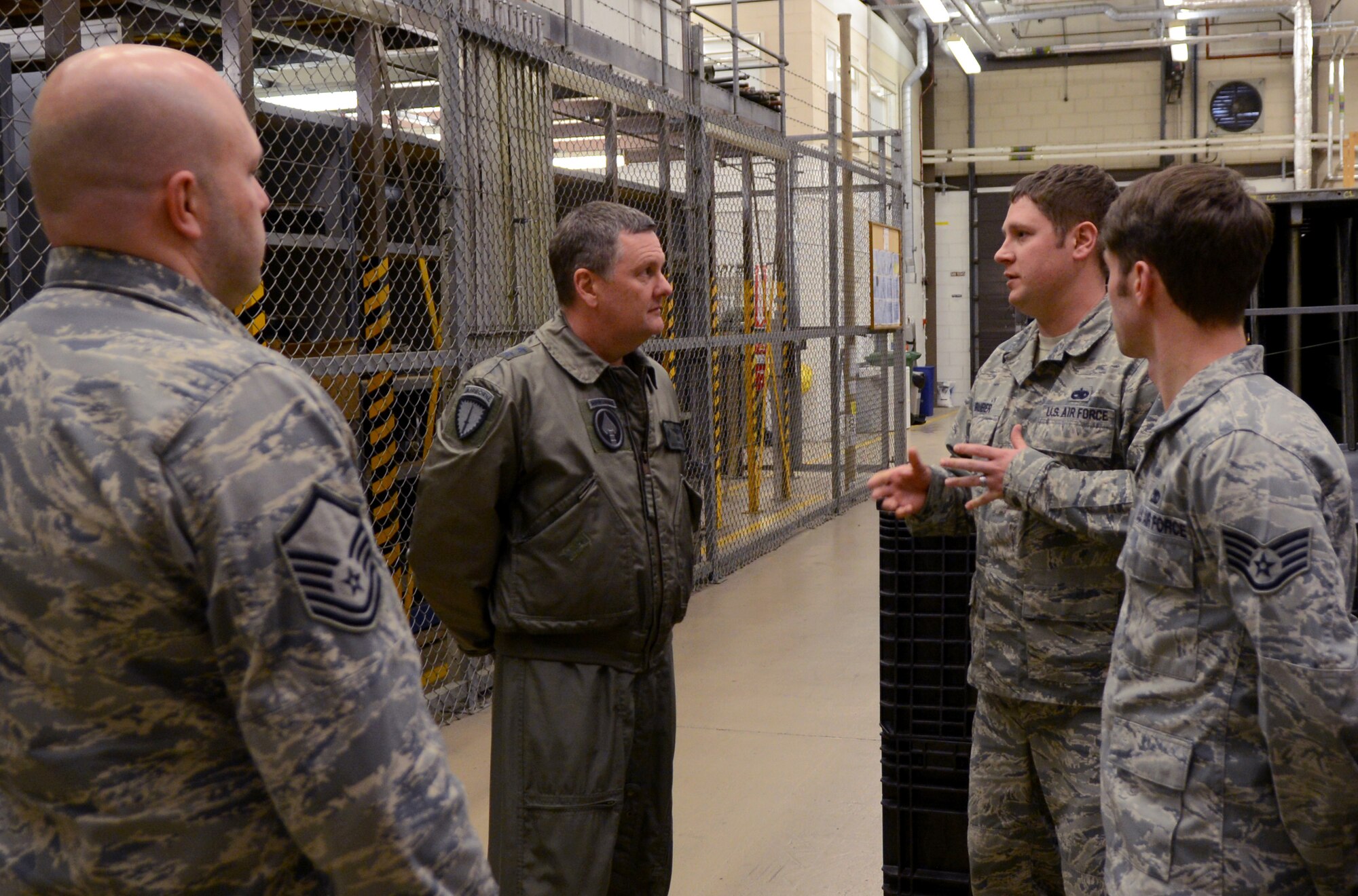 U.S. Air Force Maj. Gen. Marshall B. Webb, U.S. Special Operations Command Europe commander, speaks with Airmen assigned to the 352nd Special Operations Maintenance Squadron Jan. 24, 2014, during his visit to RAF Mildenhall, England. Webb met with Airmen assigned to the 352nd Special Operations Group, its subordinate units and other units under his command during his visit. (U.S. Air Force photo by Airman 1st Class Jonathan Light/Released)