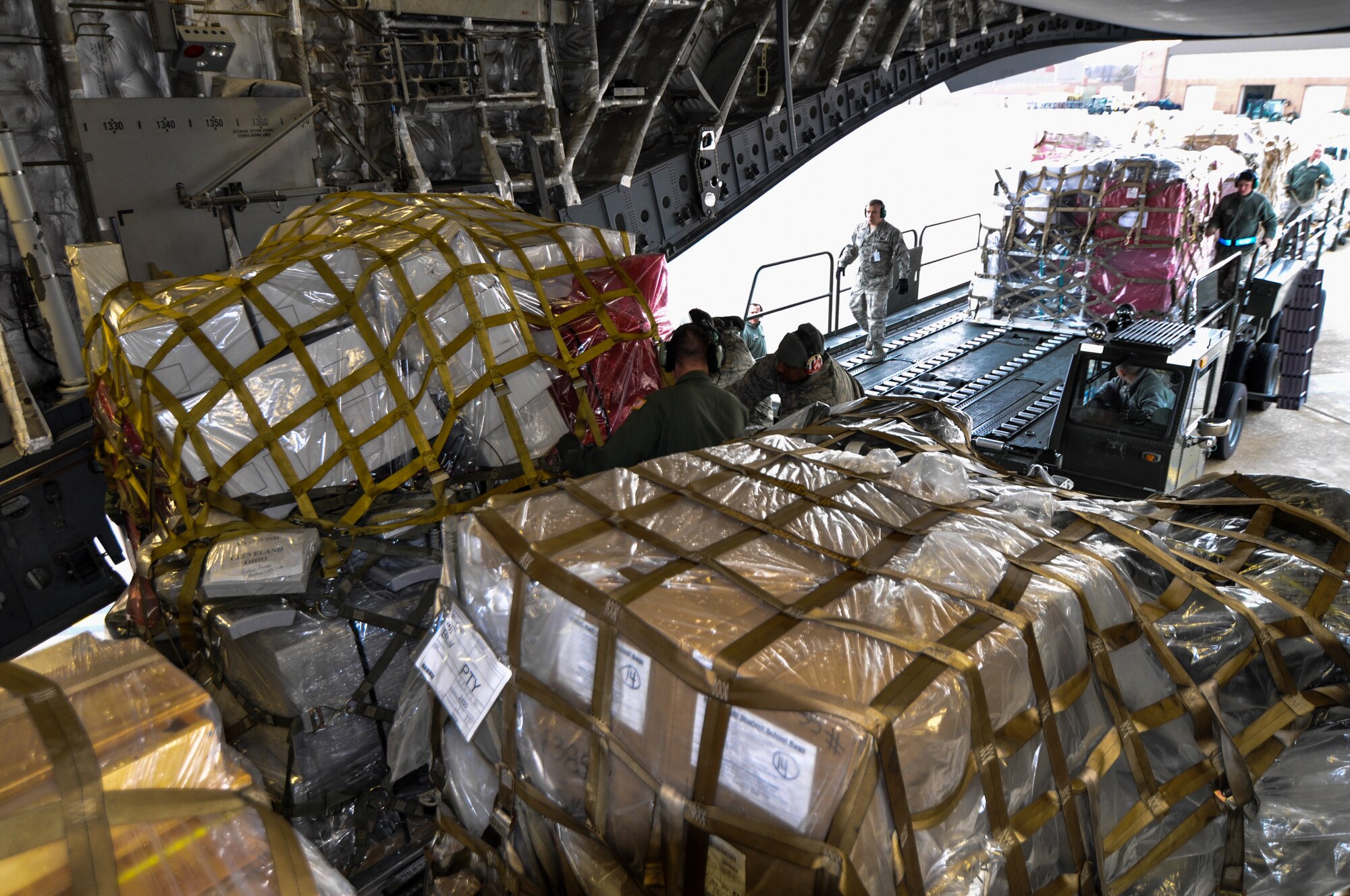 Humanitarian aid being loaded onto a Charleston based C-17 Globemaster III flown by reservists from the 701st Airlift Squadron.  The donated humanitarian aid was bound for Panama and Honduras. (U.S. Air Force Photo/Maj. Wayne Capps)