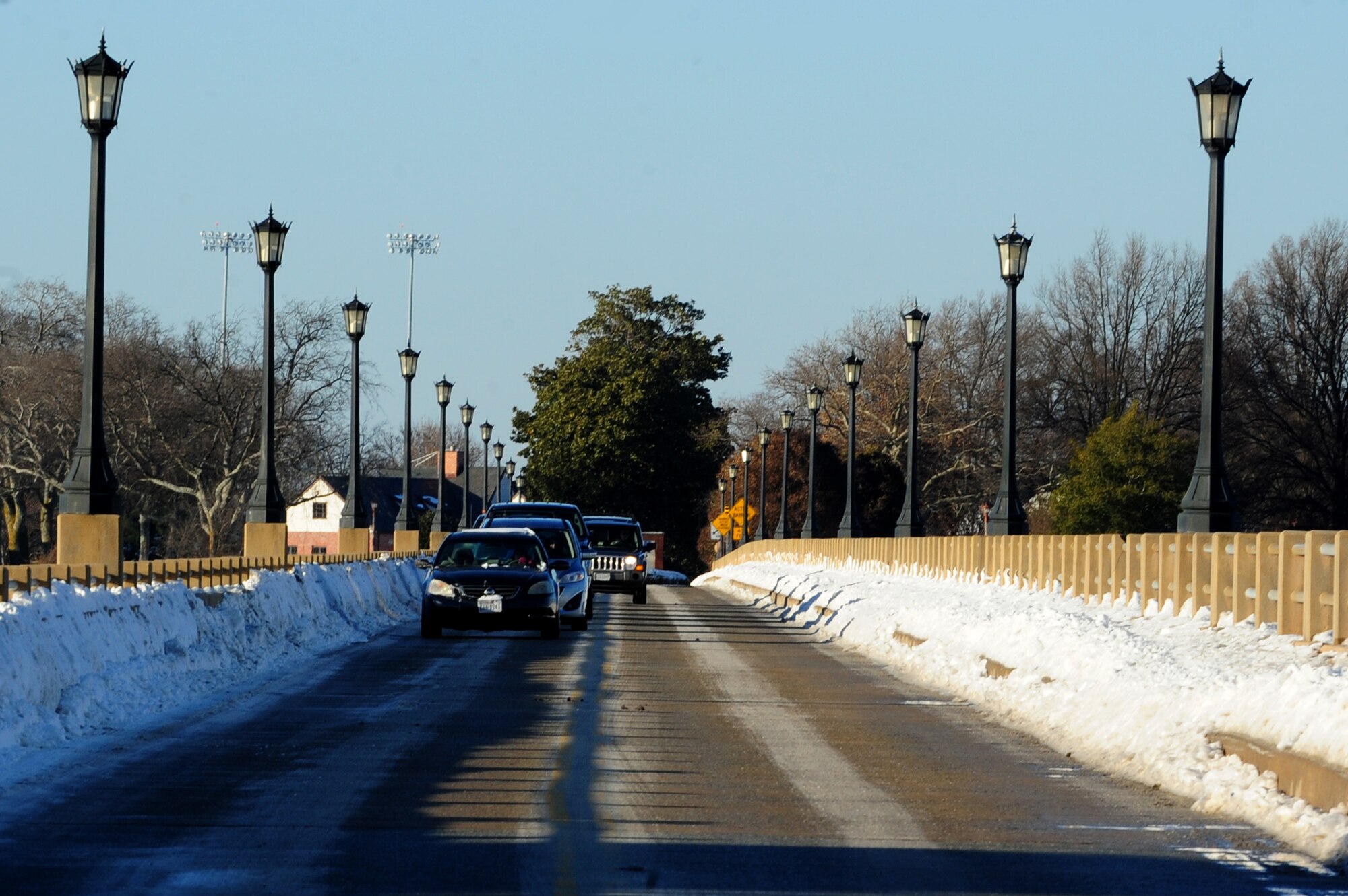 Cars drive across the King Street bridge at Langley Air Force Base, Va., Jan. 30, 2014. The snowfall, which began Jan. 28, ranged from eight to 10 inches around the Hampton Roads area. (U.S. Air Force photo by Airman 1st Class Areca T. Wilson/Released)