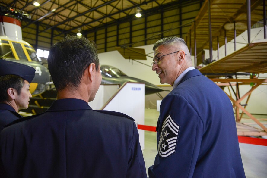 Chief Master Sgt. Manuel Roblesreynoso, 374th Airlift Wing command chief, tours the on-base Japan Air Self-Defense Forces museum at Iruma Air Base, Japan, Jan. 30, 2014.  The museum showcased the history of aircraft and Japanese military, dating from the 1930’s to modern JASDF. (U.S. Air Force photo by Airman 1st Class Soo C. Kim / released)