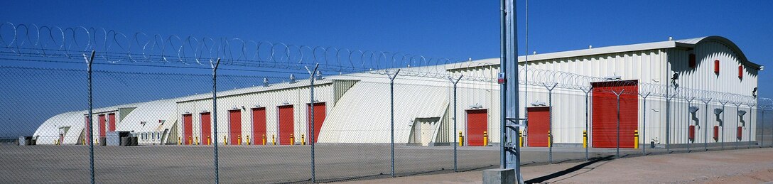 The Armament Maintenance Building, built for the Afghan National Army's 215th Corps at Camp Shorabak, is one of the largest arched steel panel buildings in country. The 79 foot-wide, 548 foot-long, building includes machine storage, small arms repair, calibration room, turret repair, weapons cleaning, office space, storage, communications room, and welding, paint and machine shops. This building is part of an ANA installation U.S. Army Corps of Engineers officials act as construction agents for, overseeing them in accordance with Federal Acquisition Regulations and Corps guidance. According to Transatlantic Division Commander Maj. Gen. Michael Eyre, it is some of the best construction he’s seen in Afghanistan. (U.S. Army Corps of Engineers photo by Bill Dowell/released)