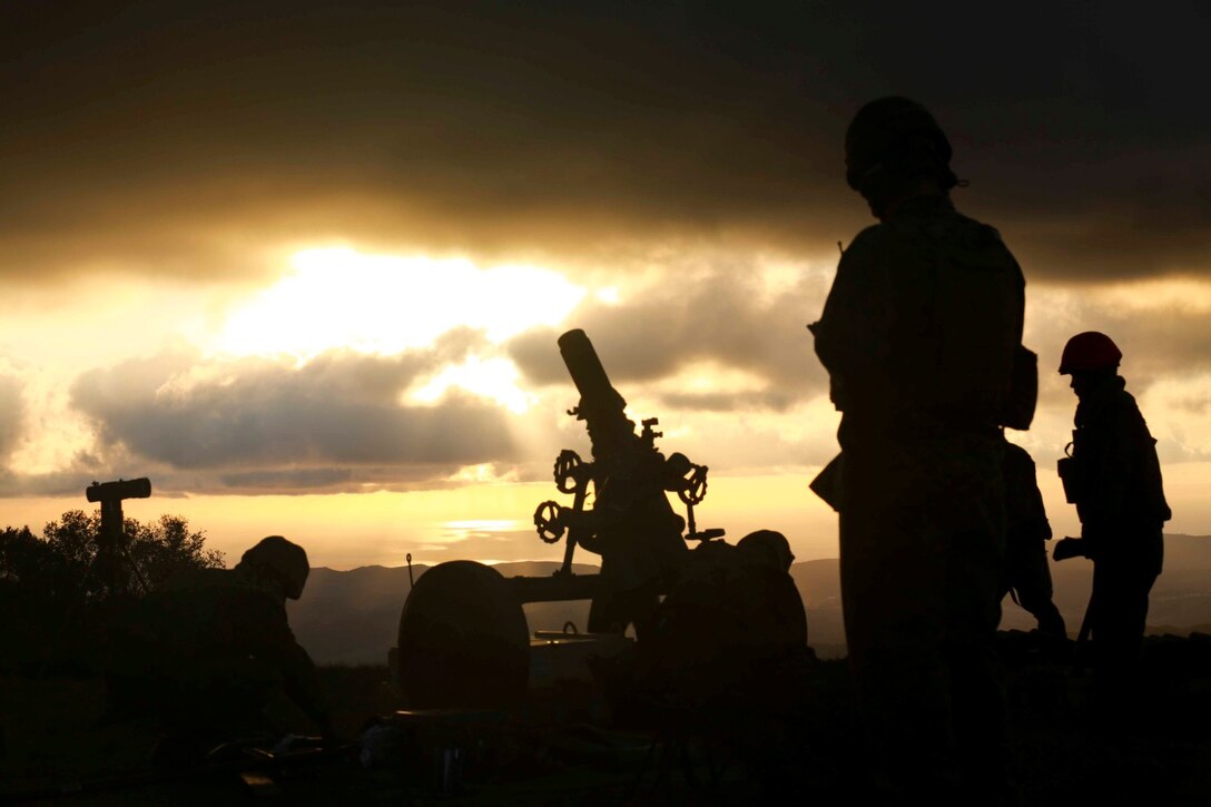Soldiers from the Japan Ground Self-Defense Force prepare a 120mm mortar system during Exercise Iron Fist 2014 aboard Camp Pendleton, Calif., Feb. 3, 2014.  Iron Fist 2014 is an amphibious exercise that brings together Marines and sailors from the 15th Marine Expeditionary Unit, other I Marine Expeditionary Force units, and soldiers from the JGSDF, to promote military interoperability and hone individual and small-unit skills through challenging, complex and realistic training. (U.S. Marine Corps photo by Sgt. Jamean R. Berry/Released)