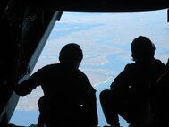 Marines from 6TH Marine Regiment 2ND Marine Division looking out the back of the Osprey on their way to USS New York in Jacksonville, FL.
