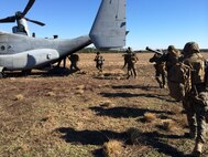 Marines from V3/6 6TH Marine Regiment, 2ND Marine Divsion boarding an Osprey during Op Fledgling Fury.