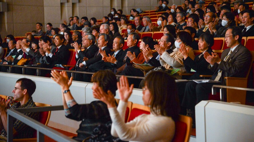 The audience gives a round of applauds during Japan - U.S. Joint Concert at Tachikawa City, Japan, Feb. 2, 2014.  The North Kanto Defense Bureau has hosted the joint concert since 2008.  (U.S. Air Forces photo by Airman 1st Class Soo C. Kim / released)