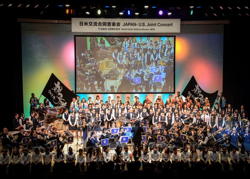 All participating performers for the Japan - U.S. Joint Concert perform It’s a Small World at Tachikawa City, Japan, Feb. 2, 2014.  The North Kanto Defense hosted the concert to foster better communication between U.S. service members, their families and people living around Yokota Air Base.  (U.S. Air Forces photo by Airman 1st Class Soo C. Kim / released)