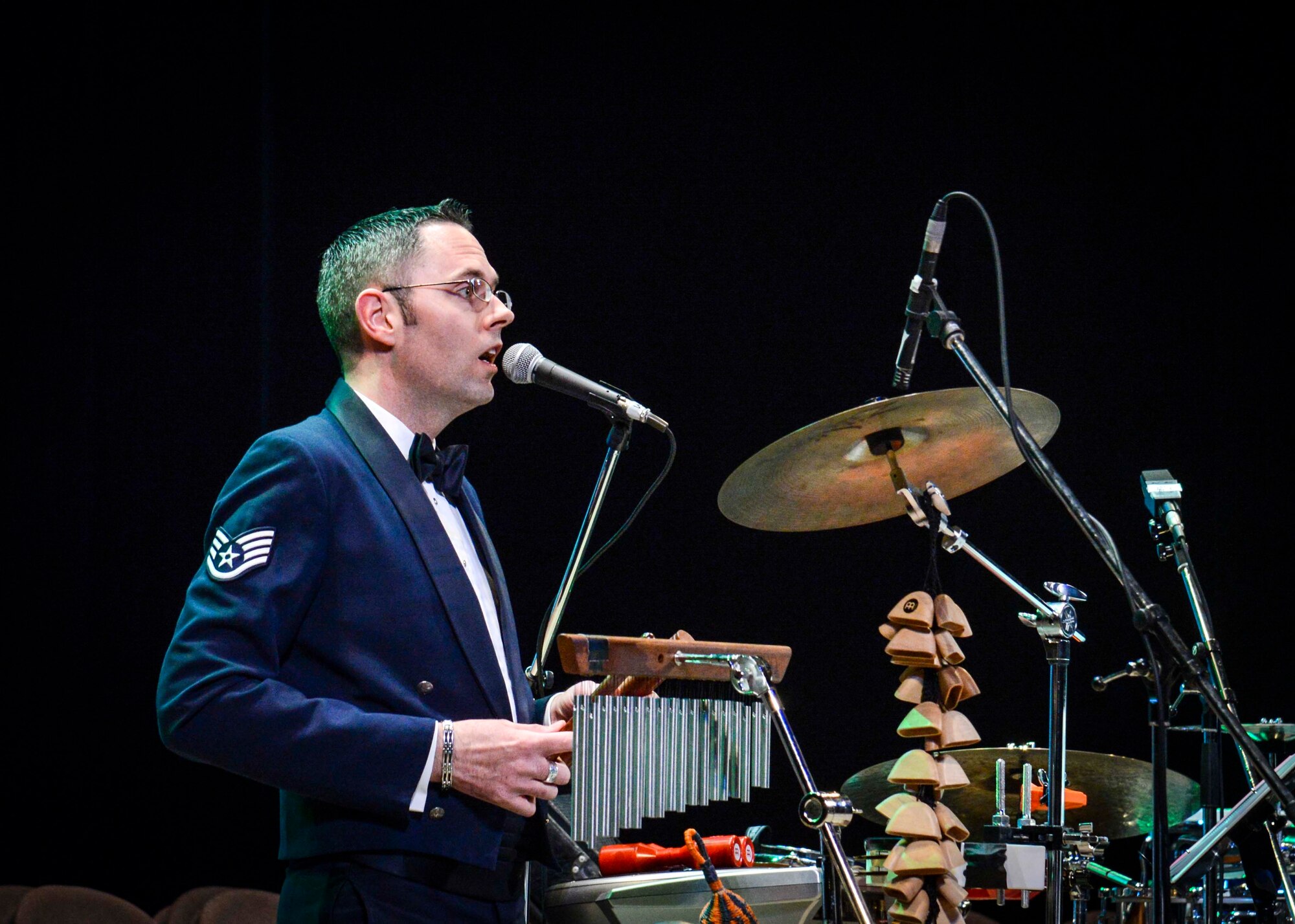 Staff Sgt. Geoffrey Fisher, the United States Air Force Band of the Pacific-Asia vocalist, sings during the Japan - U.S. Joint Concert at Tachikawa City, Japan, Feb. 2, 2014.  The North Kanto Defense Bureau holds annual friendship events - this year’s theme was building friendship through music.  (U.S. Air Force photo by Airman 1st Class Soo C. Kim / released)