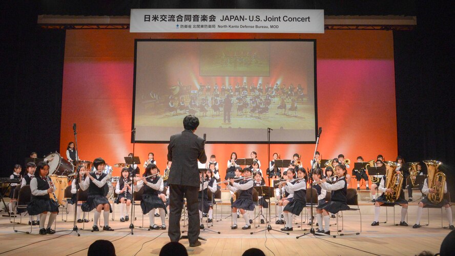 Tachikawa Keyakidai elementary school brass band club perform at the Japan - U.S. Joint Concert at Tachikawa City, Japan, Feb. 2, 2014.  Prior to the concert date, members of the United States Air Force Band of the Pacific-Asia had the opportunity to visit each participating school bands to share their music with the students.  (U.S. Air Force photo by Airman 1st Class Soo C. Kim / released)