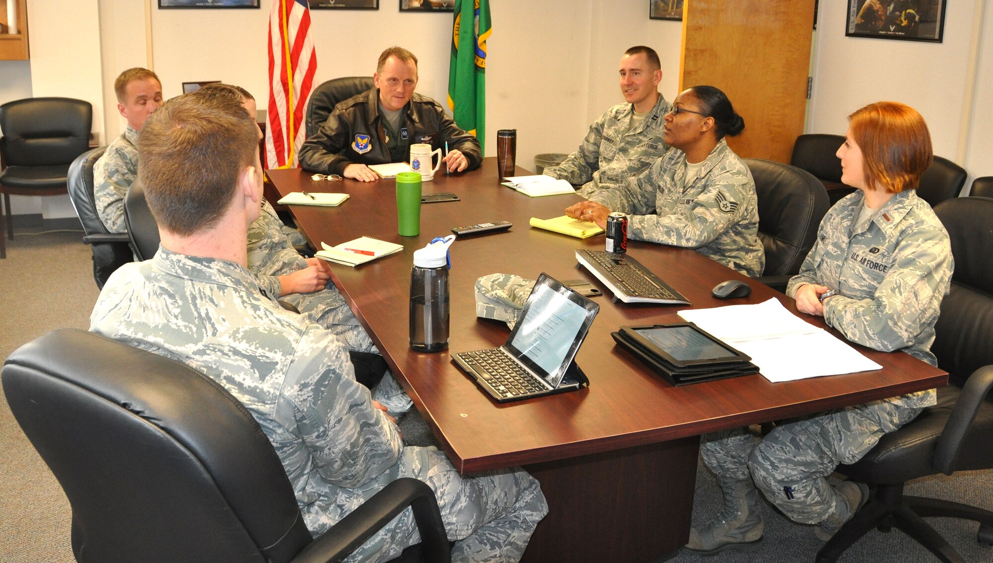 Members of the Reserve Officer Training Corps Detachment 905 at Washington State University are briefed Feb 5, by Capt. Carsten Stahr, 92nd Force Support Squadron manpower and personnel flight commander, and 2nd Lt. Evelyn Oehmke, 92nd FSS career development officer in charge, about the impending force reduction program. 