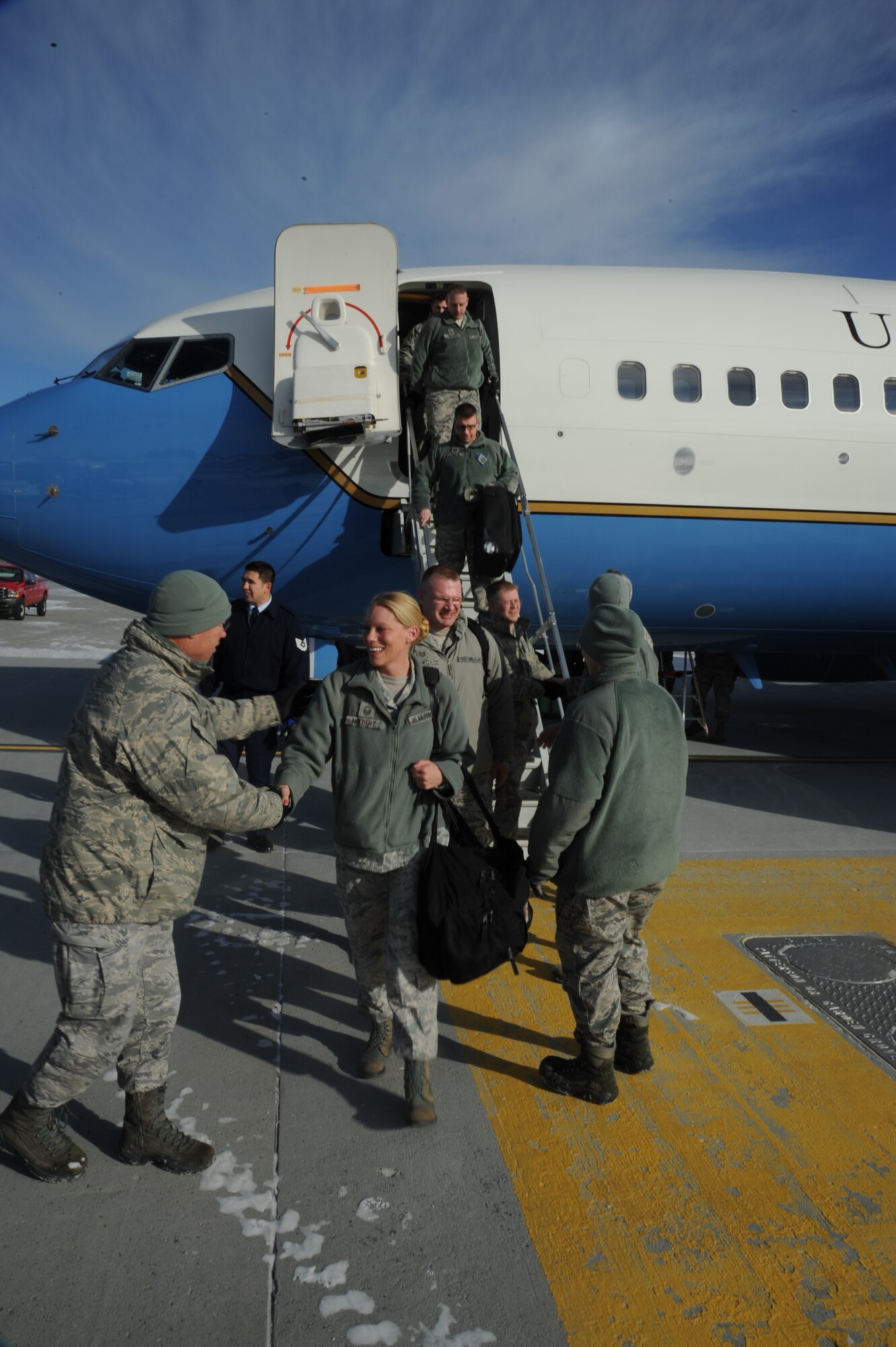 Team Fairchild leadership greets members of Air Mobility Command’s Inspector General team as they arrive for the Unit Effectiveness Inspection Feb. 5, 2014 at Fairchild Air Force Base, Wash. The inspection is scheduled to go through Feb. 14, and Fairchild is the third AMC base to undergo the inspection. (U.S. Air Force photo by Airman 1st Class Samuel Fogelman/Released)