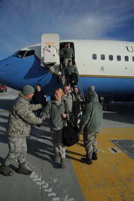 Team Fairchild leadership greets members of Air Mobility Command’s Inspector General team as they arrive for the Unit Effectiveness Inspection Feb. 5, 2014 at Fairchild Air Force Base, Wash. The inspection is scheduled to go through Feb. 14, and Fairchild is the third AMC base to undergo the inspection. (U.S. Air Force photo/Airman 1st Class Samuel Fogelman)