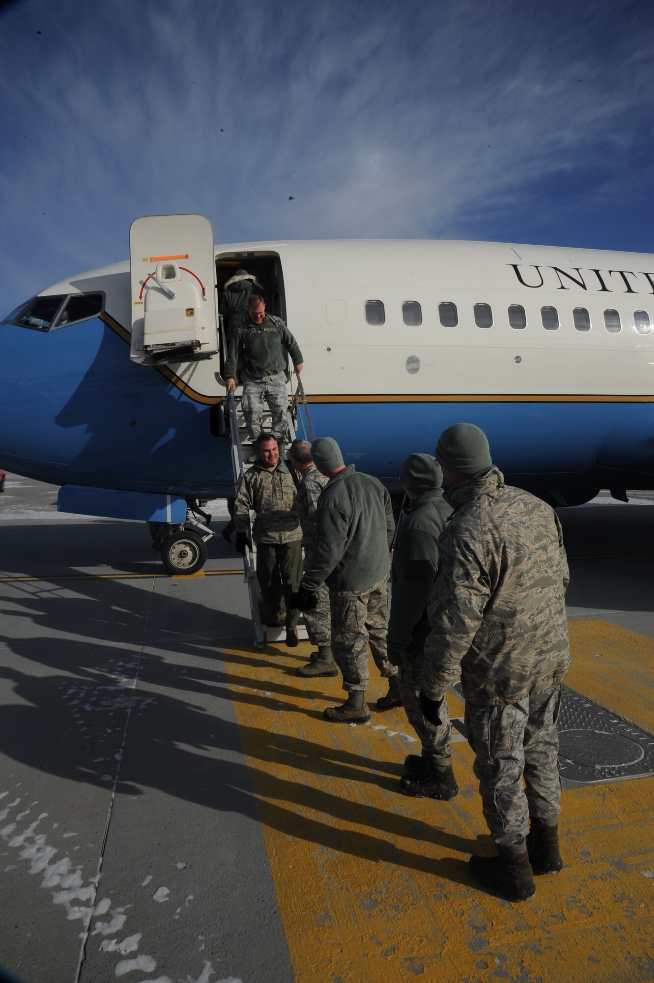 Team Fairchild leadership greets members of Air Mobility Command’s Inspector General team as they arrive for the Unit Effectiveness Inspection Feb. 5, 2014 at Fairchild Air Force Base, Wash. The inspection is scheduled to go through Feb. 14, and Fairchild is the third AMC base to undergo the inspection. (U.S. Air Force photo by Airman 1st Class Samuel Fogelman/Released)