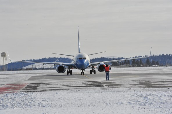 The Air Mobility Command’s Inspector General Team arrives on the flightline for the Unit Effectiveness Inspection Feb. 5, 2014 at Fairchild Air Force Base, Wash. The Fairchild UEI will continue through Feb. 14. Inspectors from the AMC IG office will be inspecting compliance, continuous improvement and self-assessment programs. (U.S. Air Force photo/Staff Sgt. Veronica Montes)